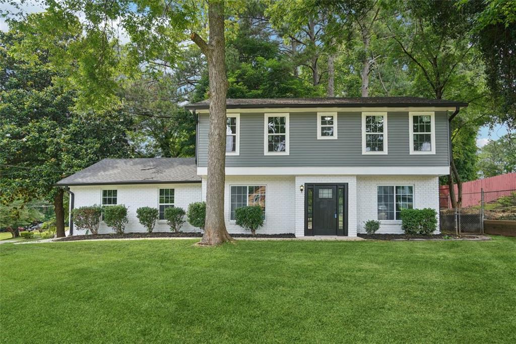 Renovated 4-bed, 4-bath home offering 2,136 sqft of living space and no HOA, set in a convenient Lithonia location close to parks, shopping, and commuter routes. Inside, you’re welcomed by fresh paint, updated flooring, and an open layout that allows natural light to flow through the main living areas. The kitchen is both functional and stylish, with white shaker cabinets, a subway tile backsplash, and stainless steel appliances, seamlessly connecting to the dining and living spaces.
Each of the four full bathrooms has been thoughtfully updated with clean, modern finishes—providing comfort and privacy for every bedroom. The fenced backyard is ideal for outdoor living, whether it's relaxing, entertaining, or giving pets room to roam. With Arabia Mountain trails, Stonecrest Mall, schools, and I-20 just minutes away, this move-in-ready home delivers the space, convenience, and flexibility today’s buyers are looking for.