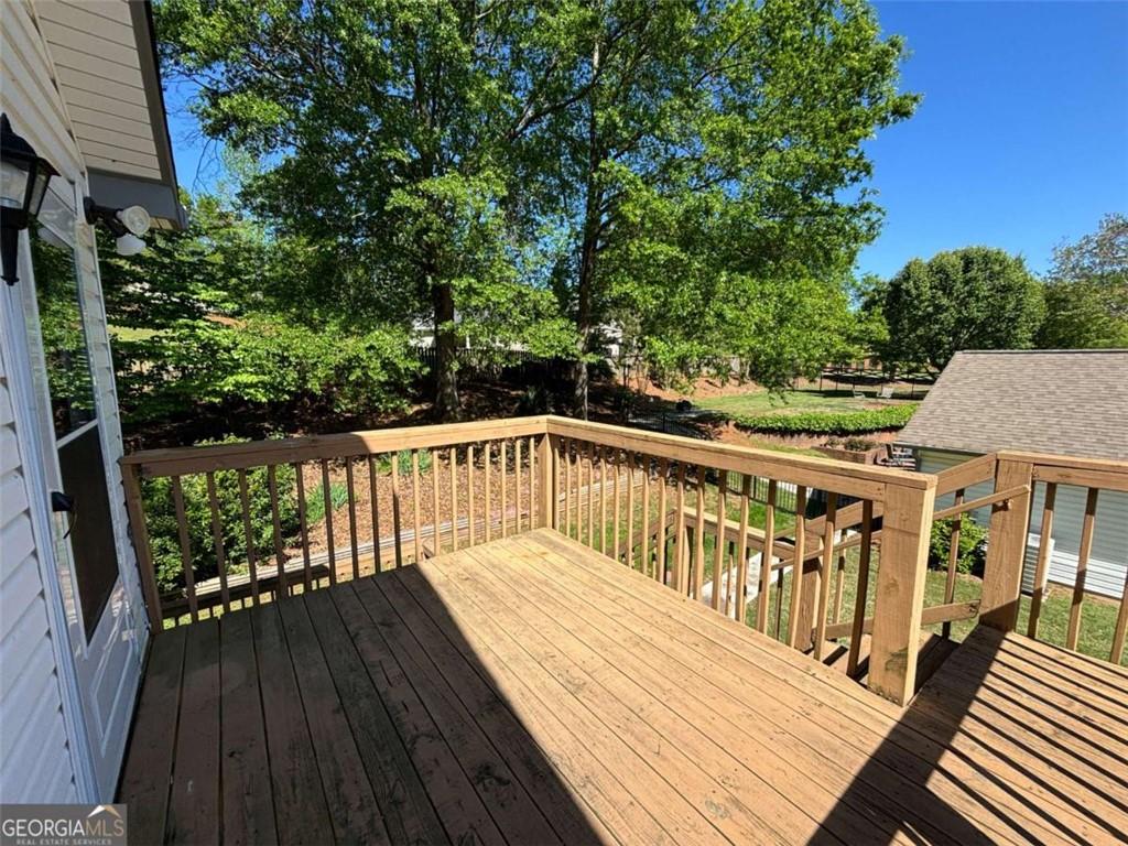 Freshly updated 1BR/1BA upstairs apartment located above a detached garage (no garage access). This well-maintained unit offers clean, efficient living with modern updates and convenient access to shopping, dining, and parks. Rent includes lawn care, water, and trash service. Total electric. No washer/dryer hookups; however, a local pickup/drop-off laundry service is available and highly recommended. Upper level only. Maximum occupancy 1 person (due to septic system). No pets. Owner resides on site. (Property managed by Move Realty Co. Owner is related to the property manager, who holds an active Georgia real estate broker's license.)