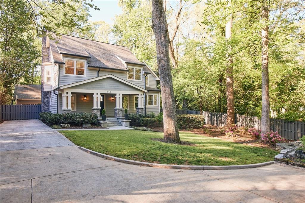 Charming custom-built Craftsman-style home tucked away in a peaceful cul-de-sac in the heart of Emory/Toco Hills, featuring a welcoming “rocking-chair” front porch perfect for enjoying sunset views. This home seamlessly blends vintage character with cozy cottage charm, offering a two-story layout that features an open loft, a warm wood-burning fireplace, a chef’s kitchen, and a comfortable reading nook. Ideally located near Lullwater Nature Preserve, Dekalb Tennis Center, Emory, CDC, VA Medical Center, and a variety of shops and restaurants—this unique gem is not to be missed!