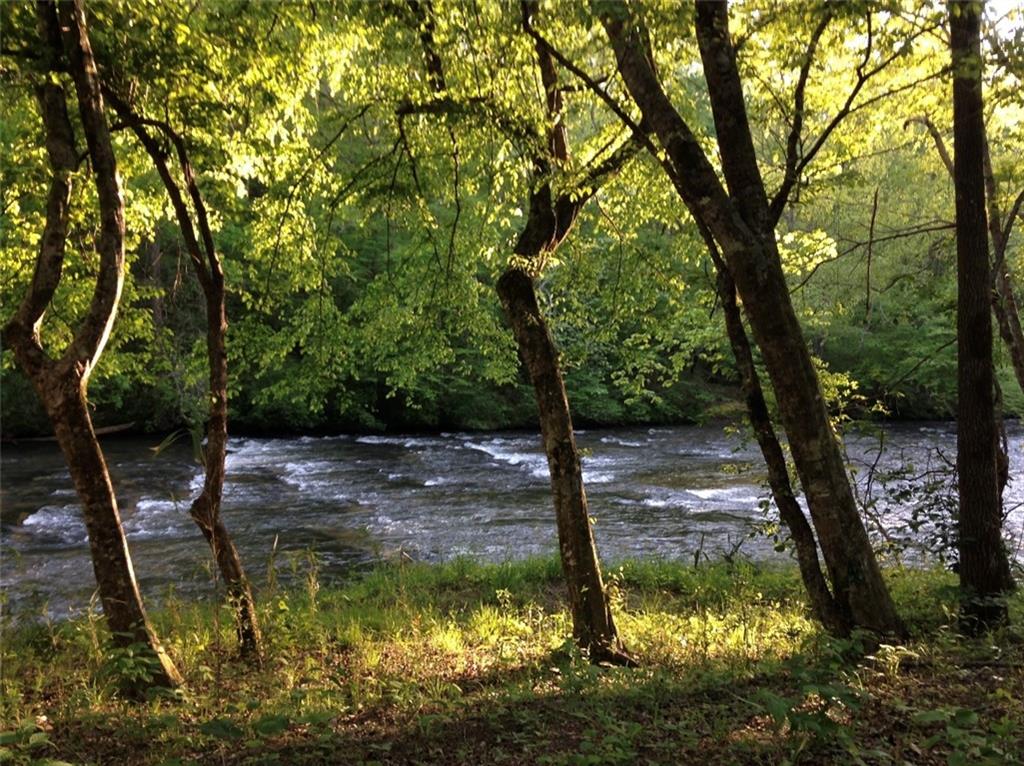 ETOWAH RIVER FRONTAGE END OF RD PRIVATE RETREAT ON 19.9 ACRES, NESTLED IN SECLUSION OF SERENITY.WATCH/HEAR/WADE THE GLISTENING SHOALS OF THE RIVER... SPEND YOUR SUMMERS DOWN RIVER.. FLOAT/KAYAK/GOLD PAN/CAMP WITH YOUR FAMILY & FRIENDS ON 19.9 ACRES..PROPERTY IS LEVEL BY THE RIVER & VIEWS are AWESOME AS WELL AS THE WATER FLOW AND SOUND... PERFECT FOR VRBO YURTS/CABINS/COTTAGES/RETREAT ETC OR YOUR PRIVATE ESTATE LOCATED JUST 10 MIN FROM GA 400. DAHLONEGA & DAWSONVILLE PROPERTY VIDEO AVAILABLE ON Youtube...DOWN RIVER.. https://youtu.be/q7UpFcSBEFA... ..BROKER/OWNER