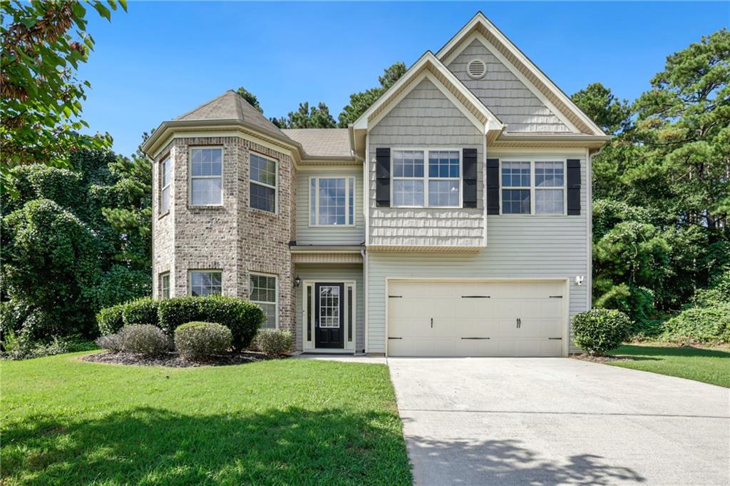 Welcome to this lovely, maintained home, ideally situated on a quiet cul-de-sac in the thriving Park Place community! Bright, open spaces and warm-toned flooring flow throughout the main level, creating an inviting atmosphere from the moment you step inside. The striking two-story foyer leads to a versatile flex room—perfect as a formal living room, dining area, or dedicated home office. The sunlit, open-concept living room features a cozy fireplace, making it an ideal space for gathering and relaxing. The adjacent modern kitchen is both stylish and functional, showcasing granite countertops, an island with room for seating, a spacious pantry, and a bright breakfast nook with tranquil views of the tree-lined backyard. Upstairs, escape to the oversized primary suite, complete with a double tray ceiling and ample space for a cozy sitting area. The en-suite bath offers dual vanities, a soaking tub, a separate glass-enclosed shower, and a generous walk-in closet. Three additional spacious bedrooms and a full hall bath provide room for everyone, while the upstairs laundry room adds everyday convenience.
Step outside to a large patio slab—perfect for outdoor entertaining, grilling, or simply unwinding—backed by the serenity and privacy of mature trees. Enjoy community amenities such as a swimming pool, playground, and park, all while being conveniently located near top-rated schools, shopping, dining, and major commuter routes. Don’t miss your opportunity to own this delightful home—schedule your private tour today!