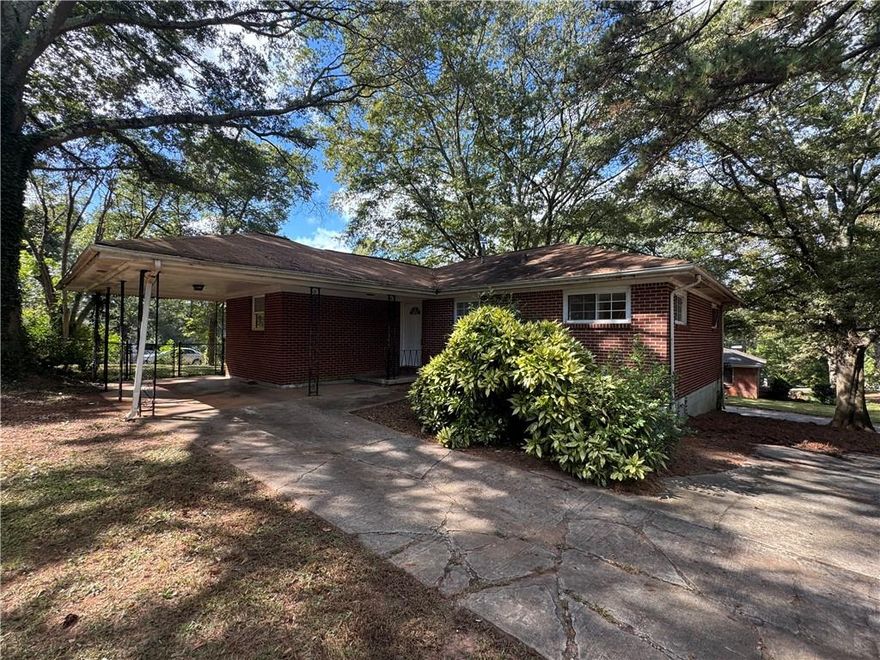 NEAR EAST LAKE COUNTRY CLUB THIS 4 SIDES BRICK RANCH HOME ON A CORNER LOT FEATURES THREE BEDROOMS AND ONE BATH WITH AN UPDATED KITCHEN AND CAR PORT. HOME IS ON A LARGE FENCED LOT YARD. SOLD AS IS NO SELLERS DISCLOSURES. .