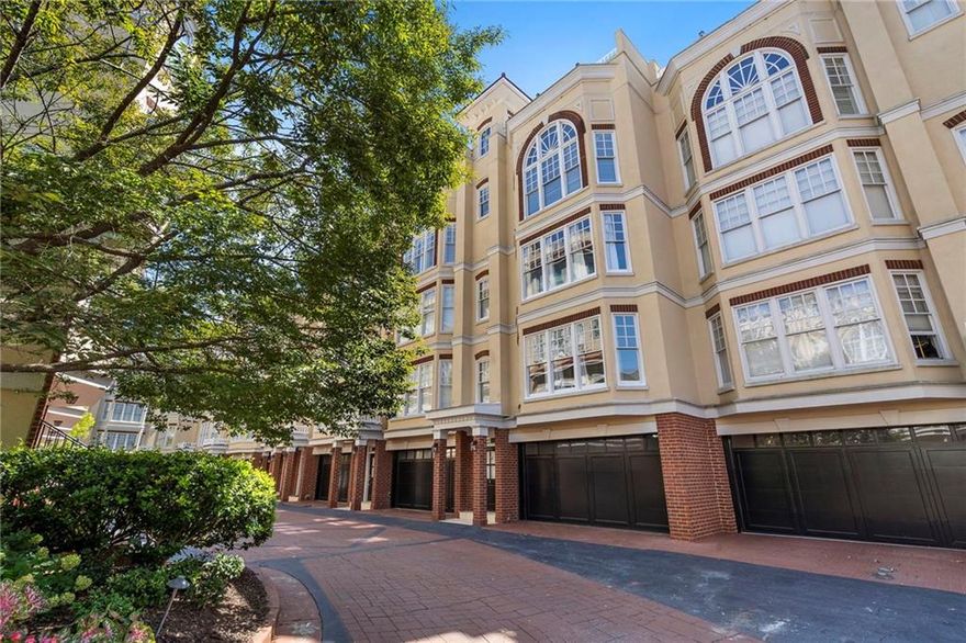 Experience upscale living in the heart of Buckhead with this beautifully remodeled townhouse in an exclusive gated community. Recently updated with a brand-new roof, a new HVAC system, and a fully renovated kitchen, this home offers modern upgrades in one of Atlanta's most desirable locations, with its very own elevator. As you enter, you'll find hardwood floors throughout and a spacious guest bedroom with an en suite bathroom on the first level. A dedicated flex room on this level is perfect for a home office, gym, or media space, and the laundry closet is conveniently located nearby. The next level is home to a luxurious primary suite filled with natural light from large windows. The spa-like bathroom features a jacuzzi tub, separate shower, double vanity, and a custom California Closet system. Upstairs, the recently remodeled kitchen with quartz countertops flows seamlessly into a dedicated dining area and an expansive living room with cathedral ceilings, a bay window front, and a cozy gas fireplace. From here, step out to the private rooftop terrace and enjoy breathtaking views of the Buckhead skyline - the perfect spot for entertaining guests or relaxing at the end of the day. All levels are conveniently accessible via elevator. Situated just minutes from Chastain Park and the Shops of Buckhead, with easy access to the area's best dining, shopping and entertainment the city has to offer. This home combines modern comforts with an unbeatable location.