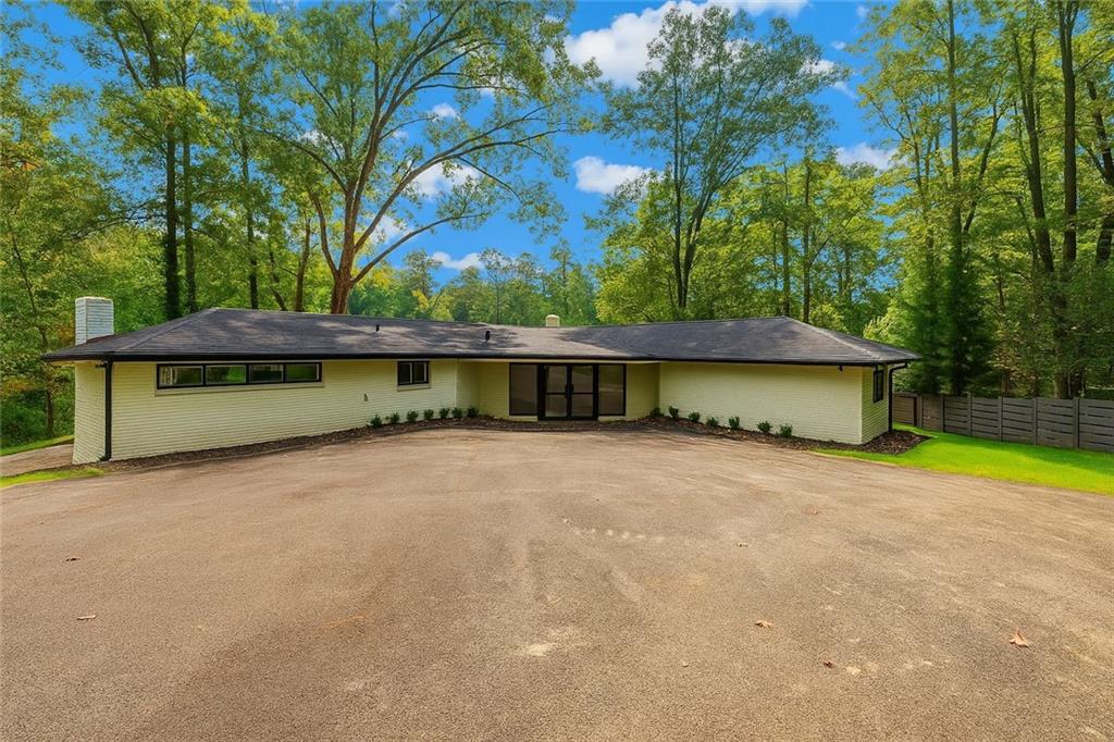 Stunning lakefront retreat on over 1 acre in the heart of Niskey Lake! This thoughtfully renovated home blends modern upgrades with timeless charm—featuring vaulted ceilings, crown molding, quartz countertops, custom cabinetry, wide-plank flooring, and updated bathrooms throughout. Enjoy water views from the open-concept living area and expansive backyard.
One of the most exciting bonus additions is the rebuilt carriage house, currently underway—perfect as an in-law suite, private guest space, or income-producing tiny home. With its own entrance and utilities, this flexible space adds tremendous functionality and future value.
Additional highlights include: new roof & HVAC, oversized lot with no HOA, and strong rental potential. Convenient to Cascade, Camp Creek Marketplace, and I-285. A rare opportunity for lifestyle living, multi-gen needs, or executive-level investment.