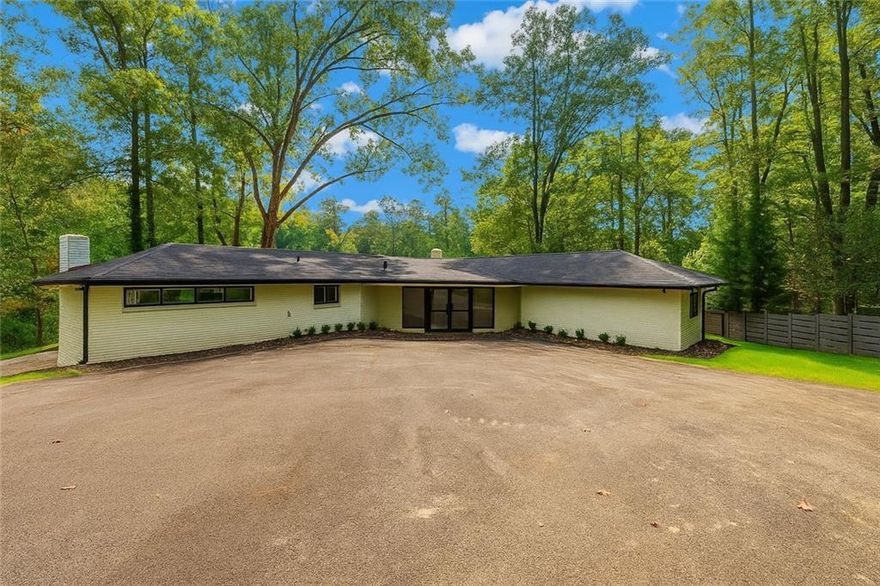 Stunning lakefront retreat on over 1 acre in the heart of Niskey Lake! This thoughtfully renovated home blends modern upgrades with timeless charm—featuring vaulted ceilings, crown molding, quartz countertops, custom cabinetry, wide-plank flooring, and updated bathrooms throughout. Enjoy water views from the open-concept living area and expansive backyard.
One of the most exciting bonus additions is the rebuilt carriage house, currently underway—perfect as an in-law suite, private guest space, or income-producing tiny home. With its own entrance and utilities, this flexible space adds tremendous functionality and future value.
Additional highlights include: new roof & HVAC, oversized lot with no HOA, and strong rental potential. Convenient to Cascade, Camp Creek Marketplace, and I-285. A rare opportunity for lifestyle living, multi-gen needs, or executive-level investment.