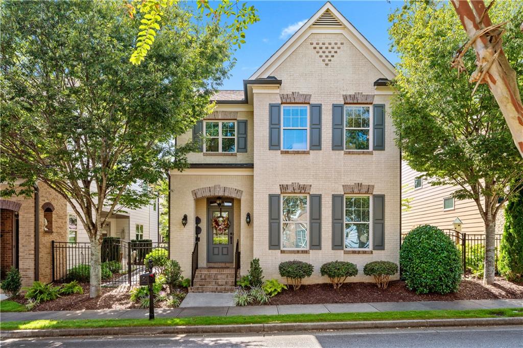 Taste and tranquility await with this beautiful gated Jamestown home in Alpharetta! This truly unique floor plan offers so much charm and flexibility. The beautiful TURN-KEY French Country exterior is accented by a lovely professionally landscaped courtyard that is large, gated and private. The original homeowner has lovingly maintained and updated the home including full exterior paint in 2023, all new super plush carpet in the upstairs bedrooms, upper foyer with new hardwoods, professionally painted white kitchen cabinets with contrasting island, new cooktop and refrigerator. The home features an exceptionally large owners suite with sitting area and two WICs. There are two additional bedrooms on this level that share a Jack and Jill bathroom. Additionally there is a 4th BR on the main level that has access to a full bath, ideal for those looking to age in place or for family unable to navigate stairs. The current owner uses this as a den. Jamestown is a highly sought after swim, tennis and pickleball neighborhood that offers mature landscaping with sidewalks and extremely low HOA fees. An easy walk to Halcyon, Big Creek Greenway, Trader Joes and proximity to the new 400 exit adds to the convenience of the area. A quick 8 minute drive to Avalon and downtown Alpharetta. Welcome home to this vibrant community.