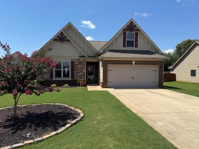 New Listing Alert!!! Come see this elegant 4-Bedroom, 2-Bathroom Ranch in Locust Grove. This home offers thoughtfully designed spaces ideal for both everyday living and entertaining. Step inside and be greeted by an open-concept kitchen and living area, featuring granite countertops, rich coffee-colored cabinetry, a stylish tile backsplash, and a wood-burning fireplace that adds warmth and charm. The private owner's suite offers a tranquil retreat, complete with dual vanities, a soaking tub, separate shower, and a generous walk-in closet. Each secondary bedrooms includes ample closet space, perfect for guests or a growing family. One of the standout features of this home is the private upstairs bonus room. This room offers comfort and privacy for overnight visitors or multigenerational living. Enjoy outdoor living in the spacious fenced backyard. This is ideal for barbecues, family gatherings, or simply relaxing in your own slice of serenity. Situated in a quiet, family-friendly neighborhood, and zoned for Locust Grove's award-winning schools, this home truly has it all. Don't miss your opportunity to experience this blend of style, space, and sophistication. Schedule your private showing today! NOTE: Seller requires a 1-hour advance notice on all showings appointments.