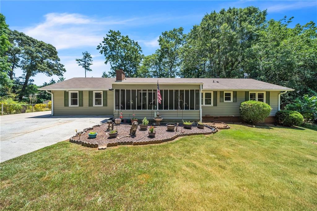 This Cozy and inviting ranch home presents a fantastic opportunity.  Start your day with a cup of coffee on this screened in front porch. Home features a large bonus/bedroom with closet and storage, Great for in-law or teen suite.  New Windows throughout. This property offers a fenced in backyard with a 20x19 workshop/Garage with concrete flooring. Convenient location, Close to restaurants, shopping, and parks. Home is sold “As Is”