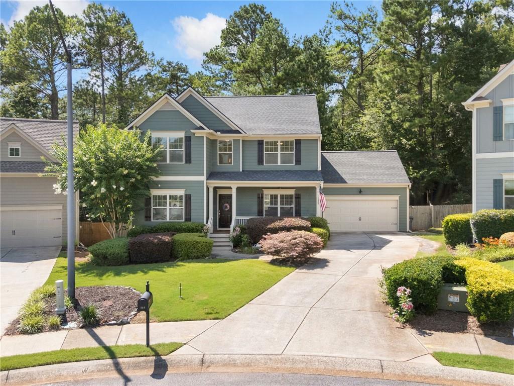 Discover this beautifully maintained Craftsman-style gem just one mile from the heart of **Downtown Woodstock**, where live music, locally owned restaurants, boutique shopping, microbreweries, and scenic walking trails await. Tucked away on a quiet cul-de-sac, this home offers the perfect blend of charm, convenience, and community.
The freshly painted exterior, newer roof, and rocking chair front porch create welcoming curb appeal. Inside, the main level showcases rich hardwood floors, a fireside family room, a bedroom on the main level with accent wall or use as your home office, a formal dining room with wainscoting, and a chef’s kitchen with custom cabinetry, granite countertops, subway tile backsplash, and a large island—ideal for everyday meals or entertaining.
Upstairs, you'll find spacious secondary bedrooms and a large owner's suite with tray ceiling, abundant natural light, and a spa-like bath. Step outside to enjoy the screened-in porch, oversized grilling deck, and private fenced yard backing to serene, wooded greenspace. A full daylight basement offers unlimited potential and is already framed for finishing.
Located within walking distance to **Mill Creek Middle School** and **River Ridge High School**, this home checks all the boxes for lifestyle, location, and long-term value. Welcome home!