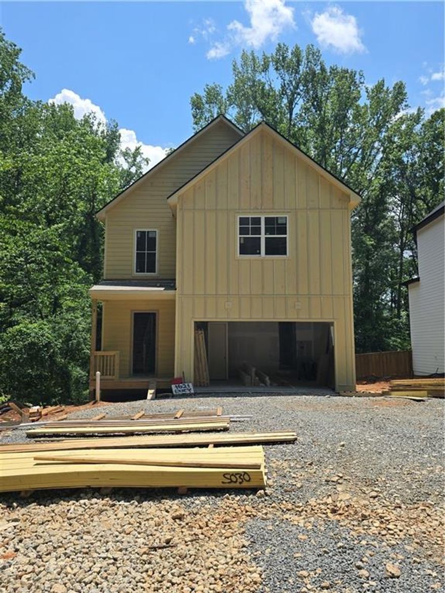 New Construction - This two Story Home has 4 Bedrooms & 3.5 Bathrooms that Features an Open concept Kitchen with quartz Counter tops, Tile Backsplash, Stainless Steel Appliances, Large Island w/ views to the Breakfast Area & Family room. Beautiful covered porch and huge coved deck. Large owner's suite room and private bath room with Large Walk-In Closet and freestanding tub. Laundry on the upper level. Home has a full unfinished Daylight basement, stubbed for bathroom, private back yard. Large two car garage. No HOA! Quiet neighborhood, easy highway access. Near Truist Park, shopping and restaurants. Southern Living Custom Builder. Estimated Completion July 2025.