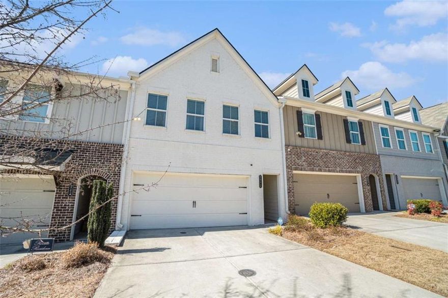 The seller is Motivated and open to contributing to the buyer's closing costs for this Stunning townhome that offers the perfect blend of modern luxury, convenience, and community living. This spacious 3 bedrooms 2.5 baths townhome was built 5 years ago, and meticulously maintained. This home boasts upscale features and an open-concept floor plan ideal for entertaining and everyday living. The spacious gourmet kitchen, equipped with top-of-the-line Whirlpool stainless steel appliances, quartz countertops, Walk-in pantry, tile backsplash, and a large island, is the heart of this home. Flow seamlessly into the dining area and family room, complete with a cozy fireplace, elegant LVP flooring, and remote-controlled automated blinds that allows more privacy and additional natural light to flow through. The generous owner's suite features dual vanities, a huge stand-up shower, nice size walk-in closet, and a sitting area. Also, from your owner's suite you have a view of the Kennesaw Mountain National Park! Two additional bedrooms provide flexibility for guests, home offices, or hobbies. Enjoy the convenience of a two-car garage, ample storage throughout, energy-efficient windows, storm door, ceiling fan in every room and security cameras are all features that make this home as practical as it is beautiful. Outside, a private patio offers space for grilling or relaxing with friends and family. The low-maintenance lifestyle allows you to spend more time enjoying everything that the City of Marietta has to offer, With award-winning restaurants, boutique shops, farmers' markets, and community events just a short stroll away, in addition, located less than 20 minutes away from the Marietta Square Market, Silver Comet Trail, The Battery of Atlanta, and Truist Park. This townhome truly combines the best of luxury and location!