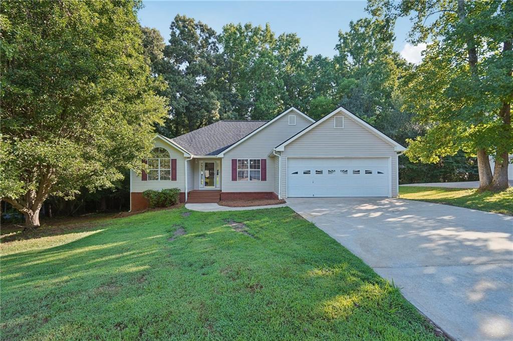 Fully Renovated Ranch in Quiet Gainesville Neighborhood!
Welcome to 7210 W Field Drive — a beautifully updated 3-bedroom, 2-bath home nestled in a peaceful cul-de-sac with a large, private backyard. This turn-key property features a functional single-level layout with brand-new finishes throughout, offering both comfort and style.
The open-concept living area boasts vaulted ceilings, fresh paint, and luxury vinyl plank flooring. A cozy brick fireplace adds charm and warmth to the spacious family room. The kitchen has been completely remodeled with new stainless steel appliances, quartz countertops, shaker-style cabinetry, and a modern tile backsplash.
The oversized primary suite includes a walk-in closet, updated lighting, and an ensuite bath with double vanities and updated fixtures. Two additional bedrooms share a fully renovated hall bath. Enjoy relaxing or entertaining outdoors on the newly rebuilt back deck overlooking mature trees and a level yard.
Key Features:
• 3 Bedrooms | 2 Full Bathrooms
• Fully Renovated Interior
• Open Concept Living & Dining
• Updated Kitchen w/ Stainless Steel Appliances
• Quartz Countertops & Modern Fixtures
• Vaulted Ceilings & Fireplace
• New LVP Flooring & Carpet
• Fresh Paint Throughout
• New Back Deck & Large Private Backyard
• Attached 2-Car Garage
• Quiet Cul-de-Sac Location
Conveniently located just minutes from schools, shopping, and I-985, this home offers modern upgrades with move-in-ready convenience.
Schedule your private showing today—this one won’t last long!