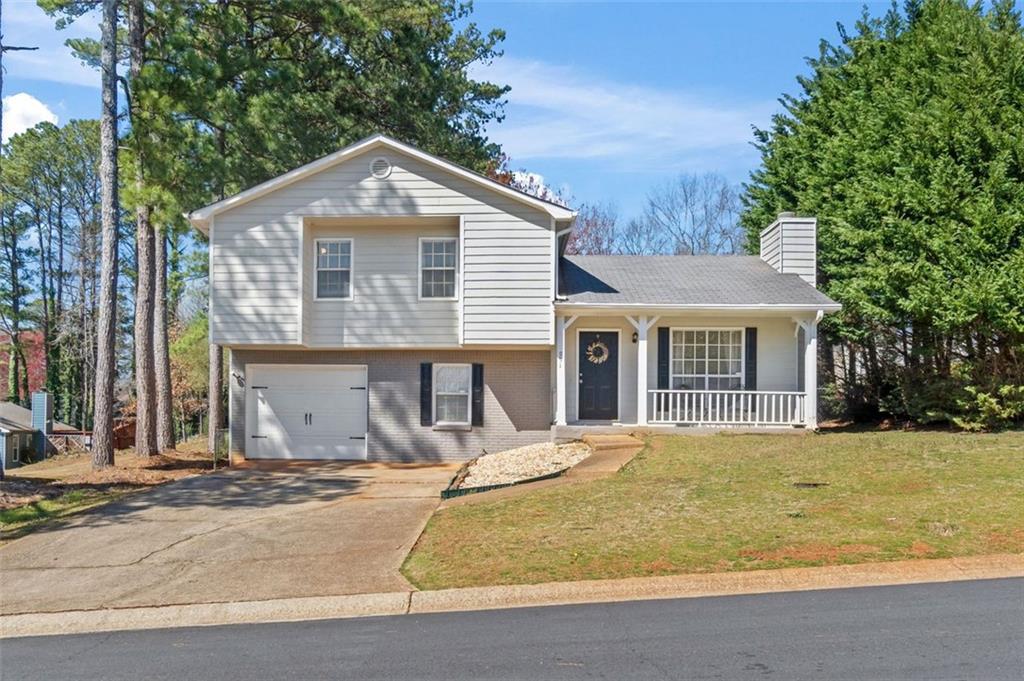 NEW Roof! NEWER HVAC! Prime Location! Your Dream Home in Lawrenceville’s 30043 Awaits! Welcome to 951 Orchard Mill Ln, where comfort, style, and unbeatable location come together! Big-ticket updates like a brand-new roof and new HVAC system mean you can move in with peace of mind—the hard work is already done! Nestled in the heart of Lawrenceville’s highly desirable 30043 zip code, this beautifully maintained 3-bedroom, 2-bathroom gem offers convenience at every turn. Just minutes from Northside Hospital Gwinnett, top-rated schools, Sugarloaf Mills, Tribble Mill Park, and more—everything you need is right at your doorstep. From the moment you arrive, you’ll be impressed by the manicured front yard and fantastic curb appeal. Step inside to discover an open, sun-drenched floor plan featuring gorgeous hardwood floors, vaulted ceilings, and tons of natural light. The gourmet kitchen is a chef’s dream with tile countertops, stainless steel appliances, and a cozy dining area overlooking the private backyard. The living room is the perfect spot to unwind or entertain, complete with a charming fireplace and easy access to the deck—ideal for hosting friends or enjoying quiet evenings under the stars. The spacious primary suite provides a relaxing escape, while the additional bedrooms offer endless possibilities—guest space, home office, or playroom. Out back, you’ll find a peaceful, tree-lined yard perfect for gardening, grilling, or simply soaking up the Georgia sunshine. Don’t miss your chance to own a move-in ready home with major upgrades in one of Lawrenceville’s most sought-after neighborhoods. Schedule your showing today!