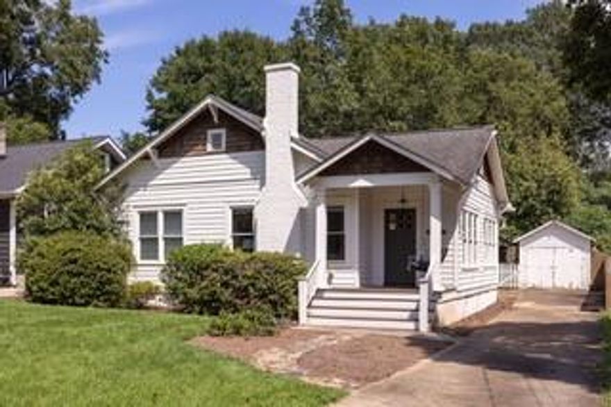 Discover timeless charm with modern convenience in this beautifully renovated 3-bedroom, 2-bathroom bungalow on one of the best streets in Howell Station. Overflowing with curb appeal, this home blends historic character with thoughtful updates for today’s lifestyle. Inside, you’ll find gleaming hardwood floors, a fully renovated kitchen, and an expansive primary suite featuring a spa-like bath with dual vanities, a walk-in shower, and a spacious walk-in closet. A well-designed mudroom with built-in shelving, laundry, and space for a dedicated desk adds both style and functionality, creating the perfect hub for everyday living.
Thoughtful design details continue throughout, including custom bookcases in the dining area and in one of the bedrooms: functional and aesthetic, they provide the perfect space for the avid reader or for showcasing treasured collections. Step outside to a fully fenced, flat backyard with a deck built in 2023, ideal for entertaining, gardening, or a place for pets to play. A private driveway provides off-street parking just outside your front and back door.

Recent upgrades, including a new HVAC system and hot water heater (both replaced in 2024), ensure comfort and efficiency for years to come. Located just moments from the Atlanta BeltLine and the vibrant Westside’s dining and shopping scene, this home offers the perfect balance of neighborhood charm and urban access.