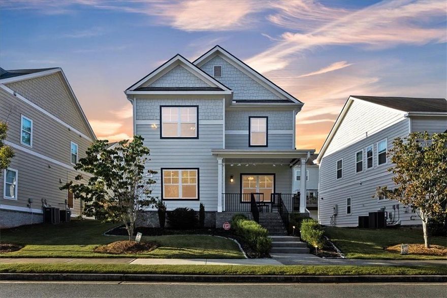 Step inside this stunning residence and be greeted by sunlight flooding the open floorplan. Soaring ceilings and gleaming hardwood floors throughout create a true sense of upscale elegance. Tinted windows allow light to pour in while maintaining privacy, creating a bright yet serene atmosphere.
The gourmet kitchen is a chef’s dream, featuring granite countertops, a center island with bar seating, ample cabinetry, and stainless-steel appliances. Its open layout provides a seamless view to the family room, making entertaining effortless. The family room, with its high ceilings and plentiful natural light, is the heart of the home. Perfect for cozy movie nights, lively game days, or simply relaxing with loved ones. Recessed and pendant lighting adds warmth and sets the perfect mood for any occasion.
Upstairs, the grand owner’s suite offers a private sitting area and a beautifully remodeled bathroom featuring a high end double vanity, freestanding tub, newly tiled floor and stand-up shower, and a spacious walk-in closet. Two additional bedrooms, a full bath, and a convenient laundry room complete the upper level.
Relax on the charming covered front porch, complete with wrought iron railing, brick laid steps, and illuminated stair lighting, perfect for sipping morning coffee, reading a book, or enjoying crisp fall evenings surrounded by the tranquility of nature.
The versatile two-car garage features a retractable screen with a convenient passage door, making it perfect for a home gym, art studio, or workshop. Enjoy all the functionality without the intrusion of bugs.
Enjoy peace of mind knowing the roof, water heater, and HVAC are only six years old.
Located just minutes from the vibrant Marietta Square, offering a variety of restaurants, breweries, festivals, concerts, and seasonal celebrations. The Battery and Truist Park are close by, providing an unmatched sports and entertainment experience. Outdoor enthusiasts will appreciate nearby Kennesaw Mountain, with its scenic hiking, biking, and walking trails. With easy access to Cobb Parkway and I-75, commuting is effortless.
This pristine home in an incredible location at an exceptional price is a rare find. All it’s missing is you!