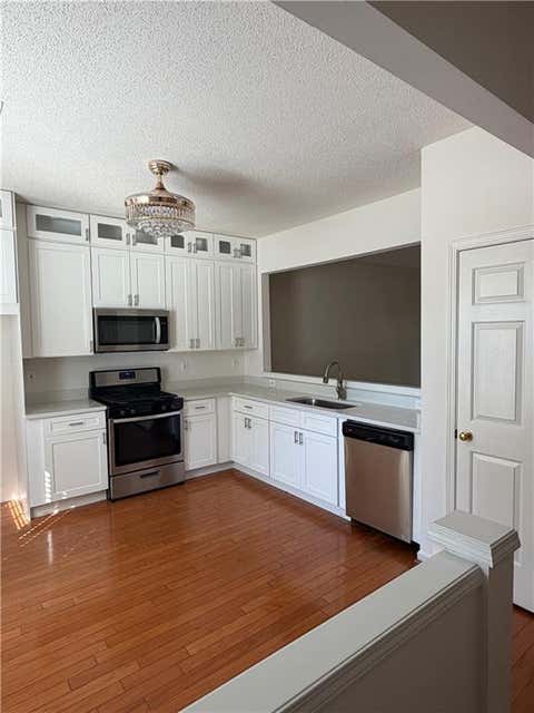 Townhouse For Sale - 4645 Valais Court Unit #107 Ct<br/> Alpharetta, GA 30022
