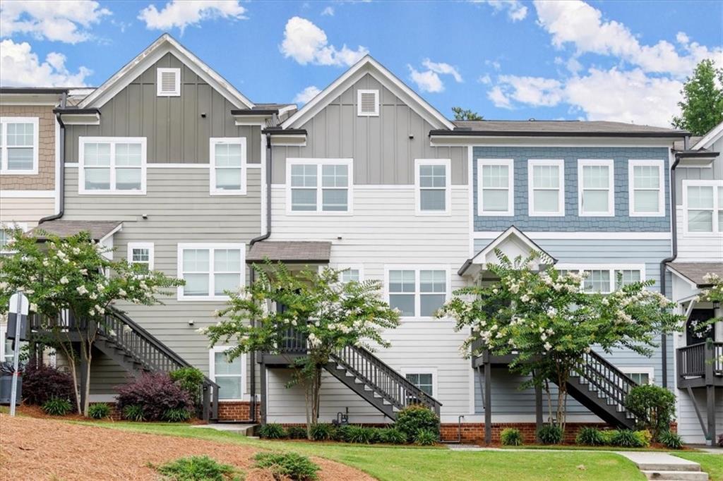 Prime Location, Convenience, Modern Charm and Maintenance-Free Living Await! Welcome to this highly sought-after Kensington Gates, a gated community just minutes away from everything Doraville/Buford Hwy could offer! Easy access to major freeways, close to the City/Buckhead, tons of restaurants and shops. Discover an impeccably maintained townhome that exudes elegance and comfort across 3 impressive levels. Built in 2019. Step inside this inviting home and be captivated by the open concept floor plan, thoughtfully designed to optimize both space and functionality. With 3 bedrooms and 3.5 baths, this townhome offers an abundance of room for your family and guests. As you enter, the stunning dining area, adjacent to the vast kitchen, showcases a huge island that serves as a focal point for culinary creativity and entertaining. Boasting updated lighting fixtures throughout, this home seamlessly blends contemporary style with classic comfort. A beautiful and cozy fireplace creates a warm ambiance and overlooks a large deck. The kitchen boasts stainless steel appliances, granite countertops, gas range, white 42" cabinets. Retreat to the oversize owners suite complete with an upgraded bathroom that exudes luxury and sophistication. Secondary bedroom with private full bath. Modern blue cabinets. 3rd bedroom on the lower level is perfect for guest or used as a media room/office. Additional features include a built-in mudroom entry off the 2-car garage, providing a convenient space to store shoes, jackets, and other essentials. Two car garage rear entry with storage closet in the garage. Don't miss the opportunity to make this remarkable townhome yours. With its prime location, modern finishes, and exceptional community amenities, this property is sure to sell quickly. Schedule a showing today!