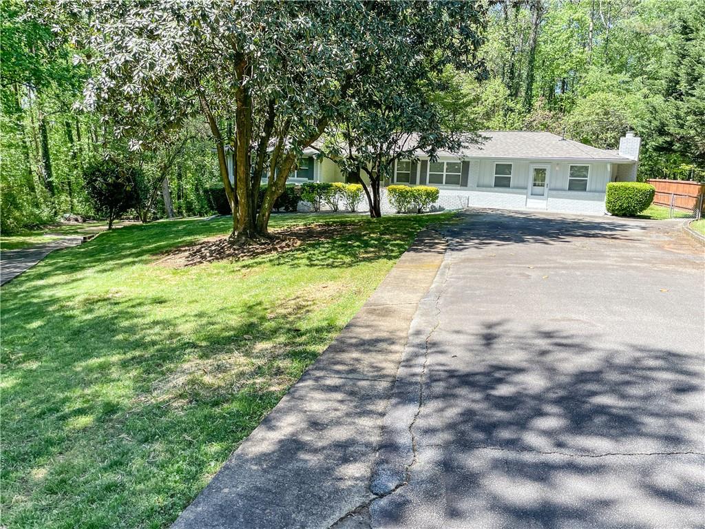 Available July 1! Completely renovated / modern brick ranch. No carpet! Open floorplan with two lg living areas. Living Rm is open to Dining Area and spacious Kitchen w/large island / breakfast bar. Kitchen has granite counters, abundant cabinets and SS appliances. Lots of recessed lighting too. Adjacent to the Kitchen is a separate Family Rm w/fplc, rear yard access and the laundry rm. At the other end is an updated Hall Bathroom, 2 Guest BRs, Master BR and an updated Master Bath w/dbl vanities and tiled shower with a bench. The rear yard is level and fenced and there is a separate driveway to a large parking pad for an RV or other vehicles.
Resident Benefit Package included. Check out our 5-Star Reviews on Google. Rent quoted reflects discount for on time payment, ask for details.