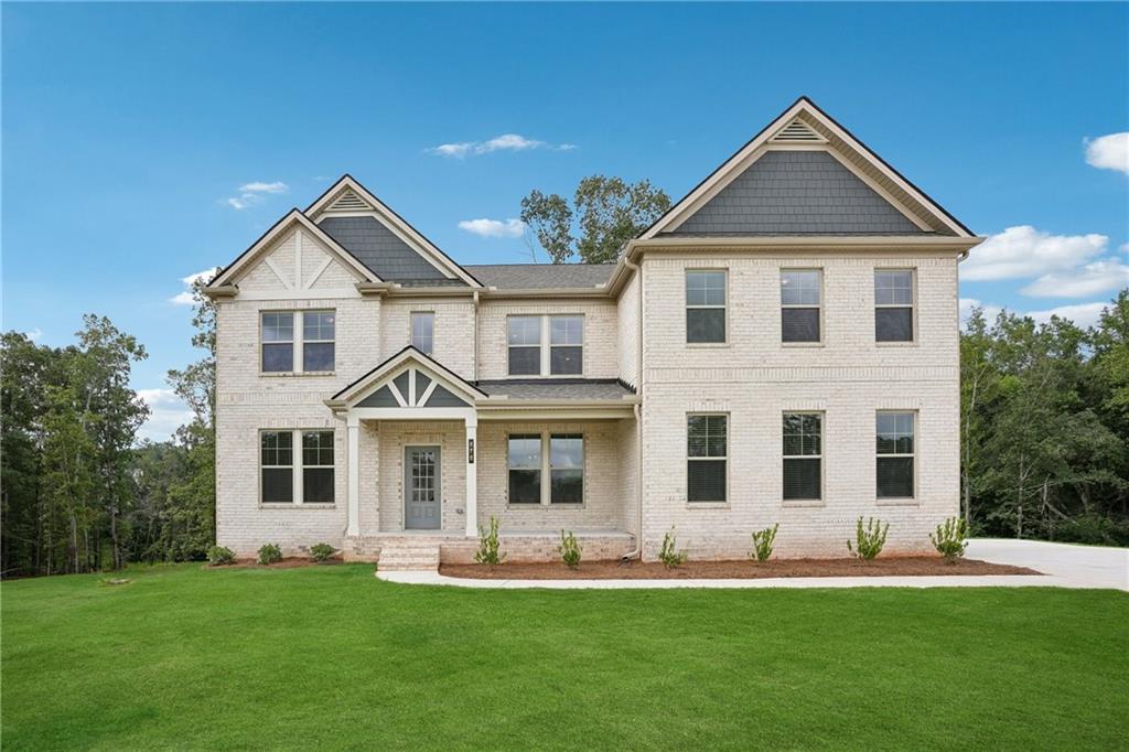 Why wait for New Construction when you can step into your MOVE-IN READY DREAM HOME TODAY? This BRAND NEW, NEVER-LIVED-IN 5-Bedroom, 4-Bathroom home is the Clarity floorplan and is located in the highly sought after Trinity Park subdivision in Mcdonough GA. This home has been carefully and thoughtfully designed by the builder DRB Homes, with premium upgrades, designer touches, and every convenience already in place—making it truly BETTER THAN NEW. From the moment you arrive, the home’s light-colored 4-sided brick exterior, side-entry car garage, and OVERSIZED driveway that fits nearly 10 cars create a striking first impression. Perfectly situated on a PREMIUM CUL-DE-SAC Lot, the property offers unmatched privacy, scenic views, and one of the best locations in the community. Step inside to a 2-story foyer, with a formal dining room to the right and a formal living room to the left (which can be converted into a home office). The heart of the home is the open concept Family Room and gourmet kitchen, featuring a brand new refrigerator, double oven, all stainless-steel GE appliances, white cabinetry, and sleek white countertops for a bright, modern look. The open floor plan flows effortlessly into the spacious Family Room with its elegant coffered ceiling, creating the perfect space for everyday living and entertaining. This spacious home includes 5 bedrooms and 4 full bathrooms, with a bedroom and full bath conveniently located on the main level complete with an upgraded standing shower. Upstairs, the large primary suite feels like a private retreat, offering a sitting area, spa-inspired bathroom with an oversized walk-in shower, and an expansive walk-in closet. The laundry room is also upstairs for added convenience and is ready to go with a brand new washer and dryer included, along with an additional loft area thoughtfully designed by the builder—perfect as a second living space, media room, or playroom. The home also boasts a very spacious unfinished basement, stubbed and ready to be customized to fit your vision—whether a home theater, gym, or additional living quarters. Blinds are installed throughout the house for immediate comfort and ease for your Family. Outdoors, enjoy an upgraded extended patio about 12’ x 30’ in size along with a beautifully crafted and sturdy back deck, perfect for relaxing or entertaining with Family and Friends while overlooking one of the best and private views in the neighborhood. This home can be enhanced even further in the future by adding a screened in sitting area underneath the deck as well as possibly extending the backyard by taking down the trees for absolutely stunning scenic view. This is your chance to own a truly turnkey luxury home—beautifully designed, completely move-in ready, and available now without the wait of new construction. Schedule your private tour today and experience the perfect blend of elegance, privacy, and convenience! *This is a Brand New Home, so please use GPS Address - 1760 Conyers Rd McDonough, GA*
