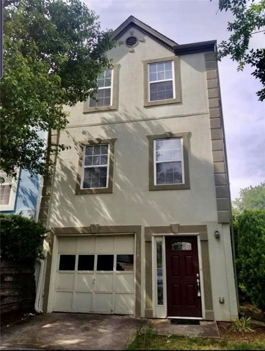 Welcome to this stunning Marietta rental, located just 10 minutes from Marietta Square! On the main level, you will find the garage as well as a small mud room area. Up the stairs, you will find the full of natural light living room and dining room area. To the left is the renovated kitchen, with stainless steel appliances, and a gas stove. The stylish fireplace with gas logs is perfect for those cold, winter nights. French doors leading to the private deck, overlook a great size yard. This home features two master suites, spacious closets, and bathrooms. The laundry room is located upstairs, & the washer and dryer are included. Great size garage, perfect for 2 cars. You don't want to miss this one.