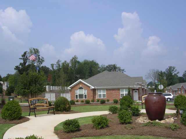 END UNIT- 4 offices; reception area; copy/break room; coffee bar has sink & H2O fountain; Entire Six Unit Building Available; 9 buildings 52 suites; $125 monthly fee incl H2O/sewer, trash, int/ext insurance, pest, ext maint.