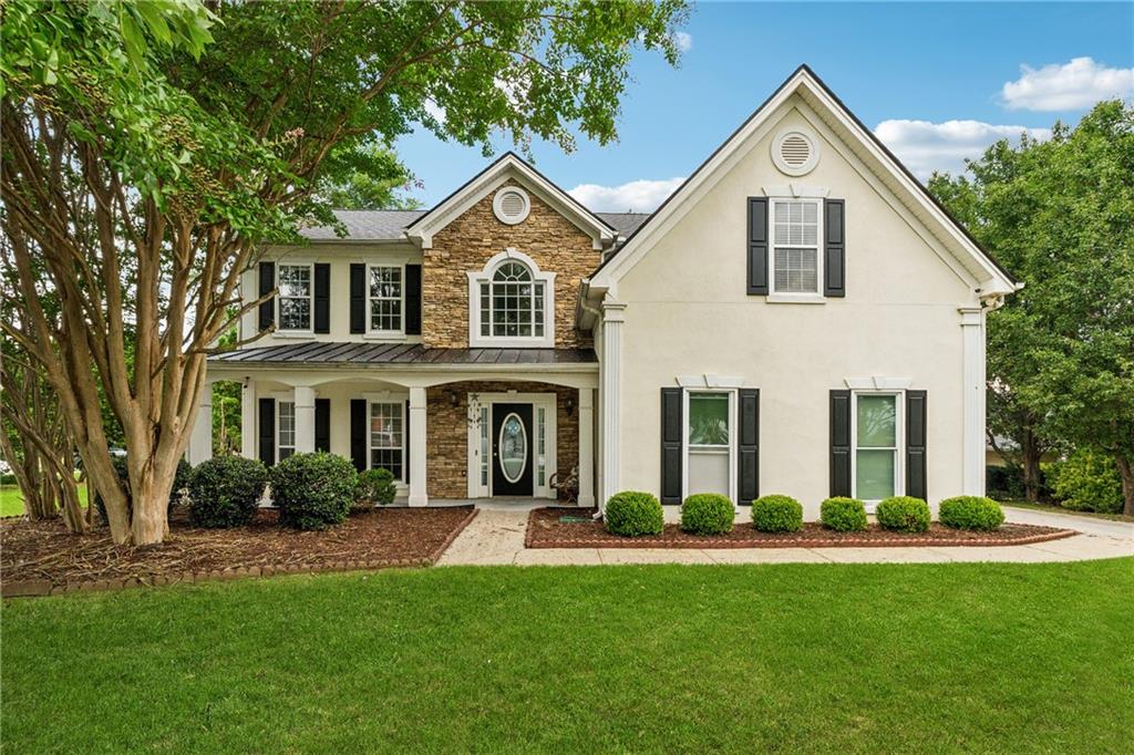 Introducing a FRESHLY PAINTED, BEAUTIFUL 4 Bedroom 3 Full Bathroom home situated on a PREMIUM CORNER LOT in the Parkview Forest Subdivision. This sought-after community in Lilburn is nestled in the award-winning Camp Creek, Trickum, and Parkview School District. Be prepared to live comfortably and effortlessly while your Family and Kids take advantage of some of the great schools in Gwinnett County along with a very friendly and Family-oriented neighborhood. This residence features 4 bedrooms, 3 FULL bathrooms (one full bath on main level), a 2-car side entry garage, plenty of driveway space, Hardwood Flooring, a NEWER ROOF, plus lots of front yard and a FENCED backyard space offering ample room and functionality for today's lifestyle. At the entrance, you are greeted with a cozy front porch perfect for relaxing after a long day at work or simply to sit back and enjoy a nice cold drink on a bright, sunny day. Stepping inside, you will find a formal living and dining room to your left along with a small hallway to the front leading up to the open living space including the kitchen, breakfast area, and family room. The main level features HARDWOOD throughout and also includes a convenient Full Bathroom with a Large Walk-In Shower. The heart of the home is the open-concept family room, sunlit breakfast area, and a connected kitchen with Stainless Steel Appliances. Upstairs, you will find an OVERSIZED Primary Suite with an attached sitting area that can be used as an office space for all your work from home needs. The Master Bathroom features separate his/hers vanities and a large soaking tub as well as standing shower. There are two closets located in the Master Bathroom along with an additional 3rd closet in the actual Bedroom. Three additional secondary bedrooms, a centrally located laundry room, and an additional full bathroom complete the upper level, offering both comfort and functionality. The LARGE, FENCED backyard is perfect for friends and family to spend quality time without compromising on the privacy of their home. Enjoy living walking distance to the SWIMMING and TENNIS amenities that Parkview Forest subdivision has to offer along with plenty of sidewalks. Conveniently located near Five Forks Trickum Rd, Ronald Reagan Pkwy, Stone Mountain Hwy, Decatur, The Shoppes at Webb Ginn, top-rated schools, and lots of community parks and walking trails. This home blends comfort, convenience, and style in one of Gwinnett’s premier communities. Don't miss your chance to own this exceptional property and schedule your private showing today!