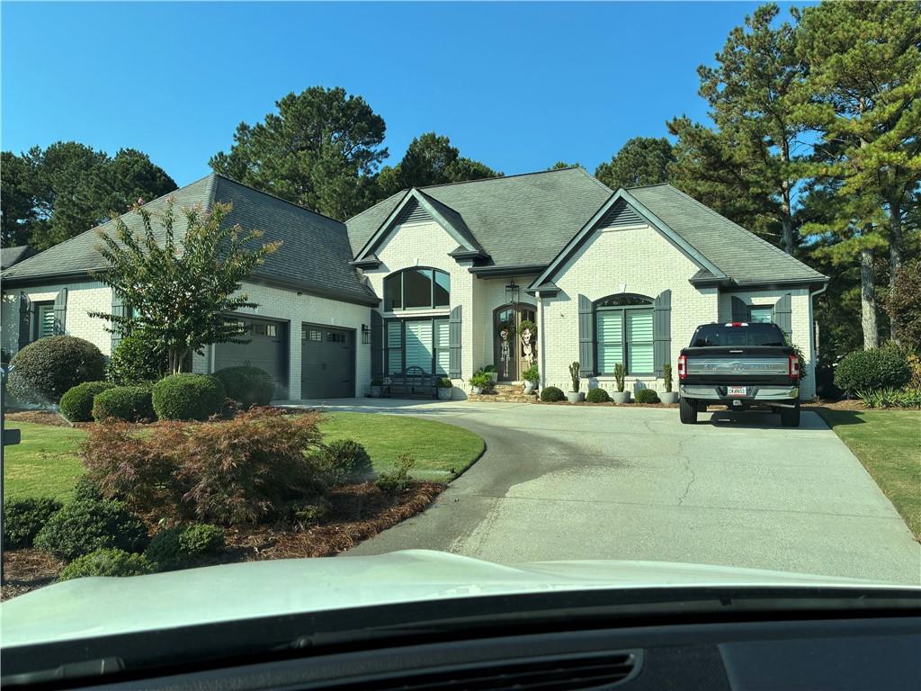 Wow! Just wow! This home should be featured in a magazine. The moment you walk into the front door you will be amazed at this, professionally decorated to perfection, home. You will love hosting family and friends for the Holidays in your formal dining room or outside on the covered pergola deck overlooking the golf course and manicure lawn. Master bedroom features a sitting room and large master bath. Imagine soaking the stress of the day away in the beautiful soaking tub or enjoy the large walk-in shower. Everything has been upgraded form the front door, wood planation blinds, flooring to the tankless water heater. To many upgrades to list here. Ride your golf cart to the Club House, Pool and Tennis, also a golf cart path to shopping and restaurants nearby. Don't miss this one!! Book your appointment today