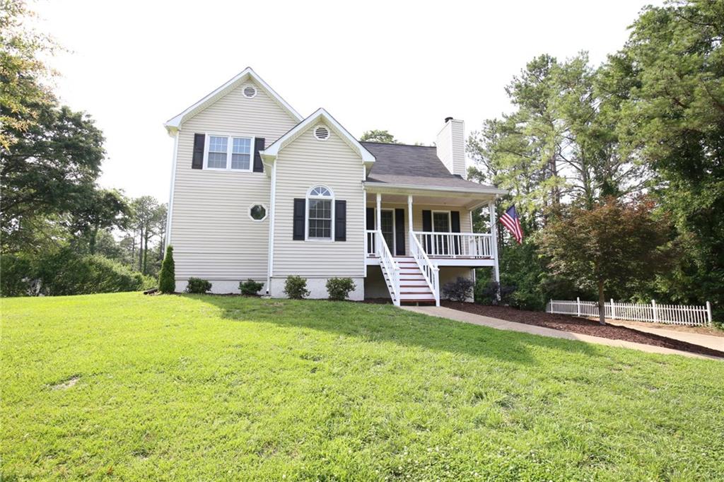 Perfectly clean and updated-ready for you! Family room with gas fireplace, updated kitchen with stainless Fridgidaire appliance package, gorgeous screened in back porch, Southern style front porch, large Master with separate tub/shower, large bedrooms upstairs, HUGE corner lot and a beautiful flat backyard! This home has been very well cared for! Basement workshop with SO much space! Master on Main. Call today.