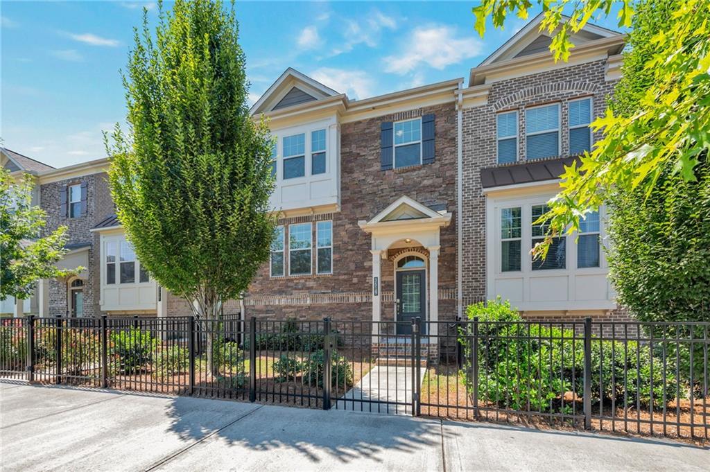 ESTATE PROPERTY SOLD AS IS WITH NO SELLER'S PROPERTY DISCLOSURE STATEMENT. In the heart of Downtown Chamblee, this gated brick townhome offers the perfect blend of style, comfort, and convenience. The open main level features hardwood floors, a chef’s kitchen with quartz countertops, white shaker cabinets, stainless steel appliances, walk-in pantry, and a large island. A spacious dining area, inviting family room, and half bath complete the floor.
Upstairs, the primary suite boasts a large walk-in closet and spa-style bath with dual vanity and tiled glass shower. Two secondary bedrooms, a full bath, and laundry room add function and flexibility. The terrace level includes a large bonus room with full bath—ideal for an office, media room, or guest suite. Enjoy outdoor living on the private balcony. A two-car garage and level driveway add convenience. Unbeatable walkable location near Chamblee favorites—Antiguo Lobo, Hopstix, Southbound, Himalayas, coffee shops, and more. Just minutes to Publix, Whole Foods, Costco, and with easy access to I-285, I-85, GA-400, and Peachtree Road.