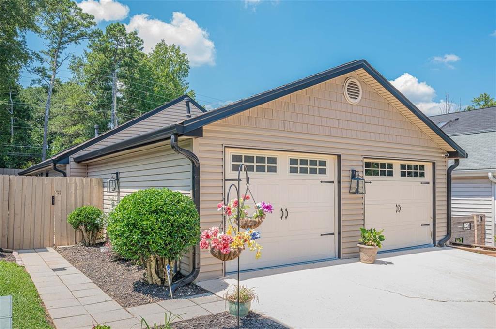 LOCATION, UPGRADES, AND CHARM – THIS ONE HAS IT ALL!
Welcome to 936 Bobcat Ct SE, a beautifully updated and move-in ready ranch in the heart of Marietta! Tucked away in a quiet, friendly community with low HOA dues and a community pool, this 2-bedroom, 2-bath home offers the perfect blend of comfort, style, and convenience.
Recent updates elevate this home to the next level, including brand new flooring throughout, a gorgeous new master bathroom shower, and a new privacy fence—perfect for pets, outdoor entertaining, or simply relaxing in your own backyard oasis.
Step inside to discover a spacious, open-concept family room featuring a stunning stone fireplace, ideal for cozy nights in. The large kitchen boasts quartz countertops, ample cabinetry, stainless steel appliances, and a sunny breakfast area—a great space for everyday meals or morning coffee.
The primary suite offers a peaceful retreat with its updated en-suite bath and generous closet space. An oversized two-car garage provides plenty of room for storage, parking, or the potential for future living space.
All of this, just minutes from Truist Park, The Battery, shopping, dining, major highways, parks, and everything East Cobb has to offer. Whether you're a first-time buyer, downsizing, or looking for a fantastic investment, this charming home checks all the boxes.
Don't wait—schedule your showing today. Homes like this don’t stay on the market long!