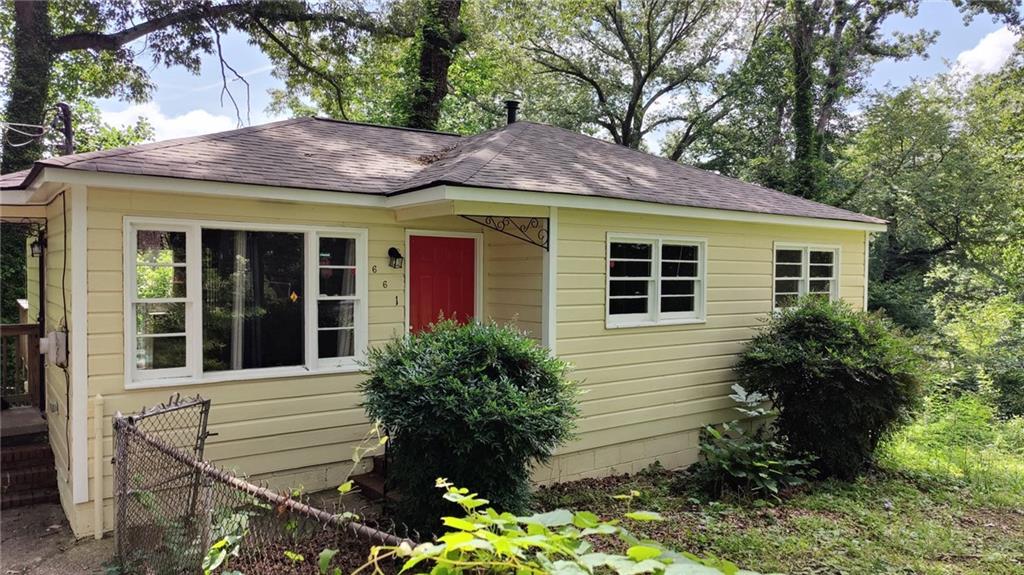 Mableton home in wooded neighborhood and walk to the only waterfall in Cobb county, unique location! The home is 3 bed and one bath bungalow with original hardwood floors, newer roof, newer HVAC, newer plumbing, and fresh paint. The ideal location of the neighborhood has entrance directly across Veterans Memorial Boulevard to grocery shopping and dining and a 5 minute drive to the Chattahoochee river trails. The commute is a straight shot to I-20, 285, and downtown. The home's convenient location has approximately 7 minute drive to Silver Comet Trail, Barnes-Mable House Amphitheater, South Cobb Regional Library, and 15 minutes to The Battery in Smyrna.