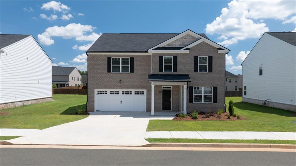 Beautiful TENNIS COMMUNITY, MINUTES FROM I-75, DINING & SHOPPING AT TANGER OUTLETS, UNBEATABLE VALUE! The highly sought after Halton PLAN is the perfect blend of functionality and everyday living. This stunning 5 bedroom with 3 bath home offers features that everyone can enjoy. PROPERTY HIGHLIGHTS: Expansive living space, est. 3216 sq ft of modern elegance, loft, guest suite on the main floor, covered patio and a 2-car garage! The main level welcomes you with 9ft ceilings and picture windows that ensure lots of natural light. The open kitchen and family room makes entertaining a breeze especially when combined with the large butler's island, sleek cabinetry, stainless steel appliances and GAS range. Your guest will be quite comfortable with the ensuite on the main. Upstairs boast a gracious sized master suite that features a sitting room, luxurious bathroom with a double vanity, a separate tub and shower, and a large walk-in closet. Also, a flexible loft space and three additional bedrooms including an ensuite. There are two additional bedrooms and ample closet space that ensures comfort and privacy for family or guests. This home is equipped with SMART HOME Technology that you can control from your mobile phone, main panel or Alexa dot. Photos used for illustrative purposes and do not depict actual home. Under Construction OCTOBER CLOSING!!! USDA ELIGIBILITY!