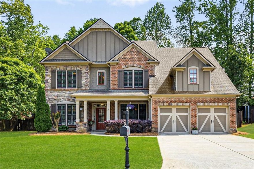 PRIME LOCATION - close to Halcyon, Avalon, and easy access to GA-400!  Nestled on a quiet cul-de-sac in one of Alpharetta's most coveted zip codes, this charming, north-facing home combines timeless elegance, generous living space, and an unbeatable location. Just minutes from Halcyon, Avalon, Downtown Alpharetta, Big Creek Greenway, and the Collection at Forsyth—with easy access to GA-400—convenience is at your doorstep.  
Set near the back of the neighborhood for added privacy, this home showcases outstanding curb appeal, one of the community's most desirable floor plans, and has been meticulously maintained with exceptional attention to detail.  The main level includes a formal dining room, large main living space, private office space, and a versatile bonus room that can easily be converted into a fifth bedroom with the addition of a closet. The centerpiece of the home is the beautifully designed kitchen, featuring an oversized island, abundant cabinetry for plenty of storage, and an open layout that seamlessly connects to the bright eat-in area and inviting living room-highlighted by a cozy fireplace, custom built-in shelving, and soaring 20-foot ceilings that flood the space with natural light.  Upstairs, the expansive primary suite offers a serene retreat with a tray ceiling, spa-like bathroom including dual vanities, a soaking tub, separate shower, and an oversized walk-in closet. The secondary bedrooms are spacious, each with generous closet space, and the conveniently located upstairs laundry room adds everyday ease.  
The 3-car tandem garage offers exceptional flexibility—perfect for third vehicle parking, a workshop, home gym, or an additional storage space.  Step outside into a fully fenced, completely private backyard oasis, designed for peaceful relaxation.  The HOA covers weekly lawn maintenance, trash/recycling pick-up service, and provides access to resort-style amenities, including a zero-entry pool with splash pad, tennis courts, a playground, and a clubhouse available for private events.  With convenient access to major highways, high-end shopping, dining, and entertainment, this home offers the ultimate in comfort and convenience. Don't miss your opportunity to make it yours!