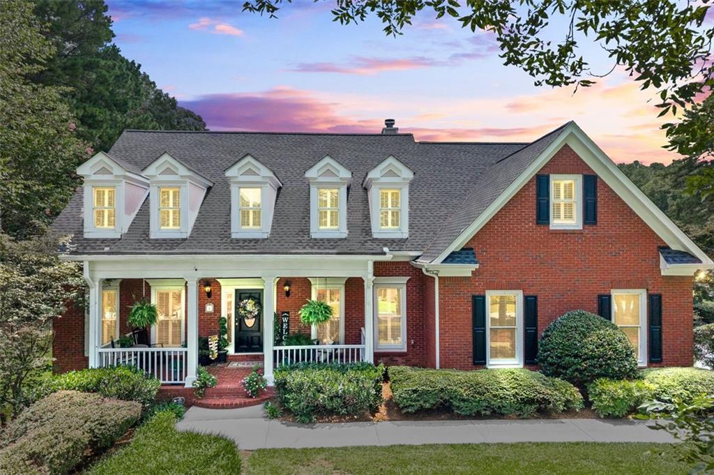 This home is an absolute must-see. Custom-built and beautifully maintained, this 5-bedroom, 4.5-bath brick home is located on a quiet cul-de-sac street and features a new architectural roof, manicured landscaping, and black wrought iron fencing enclosing a spacious level lot.
Inside, the renovated kitchen is filled with natural light and showcases white cabinetry, quartz countertops, and top-of-the-line stainless steel appliances. The formal dining room comfortably seats 10 or more guests, and a private main-level office offers dedicated workspace. The primary suite is located on the main level, complete with a sitting area and a well-appointed en-suite bath.
Upstairs, you’ll find three generously sized bedrooms and two full bathrooms. The finished terrace level includes a private entry, private patio, separate living room, bedroom with full bath, and a full sized kitchen/bar area—making it ideal for a guest suite, in-law suite, or multi-generational living.
Additional highlights include custom plantation shutters throughout, 9-foot ceilings with detailed crown molding, a lake-fed irrigation system, and a long driveway with parking for five or more vehicles. The private HOA-owned lake offers opportunities perfect for fishing, kayaking, or small boats.
Showings to start Saturday, August 2!!!!