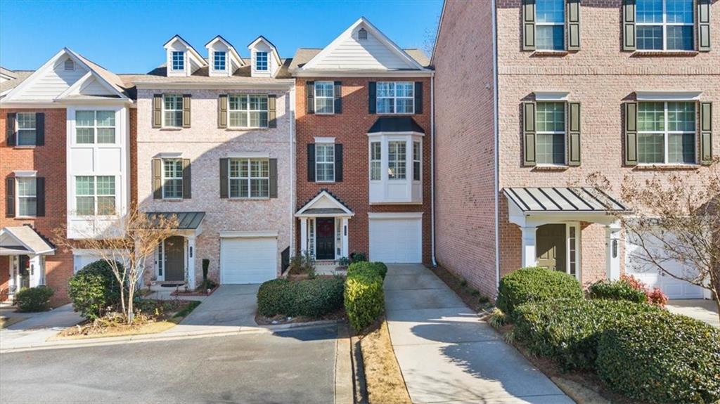 Tucked within the gated community of Cambridge, this exceptional townhouse effortlessly blends elegance, modern design, and everyday comfort. Featuring 3 bedrooms and 3.5 bathrooms, the home showcases a bright and open floor plan enhanced by upgraded LVP flooring throughout the main level. The gourmet kitchen shines with stainless steel appliances, sleek countertops, a tiled backsplash, under-cabinet lighting, and a cozy breakfast nook. Ideal for hosting, the spacious living and dining areas flow seamlessly, while the family room with its inviting fireplace offers a warm retreat. Upstairs, the luxurious primary suite features a walk-in closet and a spa-like ensuite complete with dual vanities, a soaking tub, and a walk-in shower. The secondary bedrooms are generously sized, providing flexibility for guests, family, or a home office. Step outside to enjoy the wooded, landscaped backyard, where the spacious deck, upgraded with new Trex flooring, is perfect for relaxation or entertaining. The garage and extended driveway provide ample parking, with convenient visitor spaces located directly across the street. Adding to the appeal, this townhouse shares only one wall with an adjacent unit, offering a rare sense of privacy. Low maintenance required with newer roof & water heater replaced in 2021, and professional landscaping handled by HOA! Ideally located, the home is near Morgan Falls Overlook Park, featuring scenic views, walking trails, picnic pavilions, and access to the Chattahoochee River for kayaking and paddle-boarding. Steel Canyon Golf Club is also nearby, offering an 18-hole public course, a heated driving range, and golf lessons. With easy access to top-rated schools, shopping, dining, and recreation—and just 10-15 minutes from Downtown Roswell, Buckhead, and Downtown Atlanta—this home perfectly balances tranquility and convenience. Welcome to your dream home!
