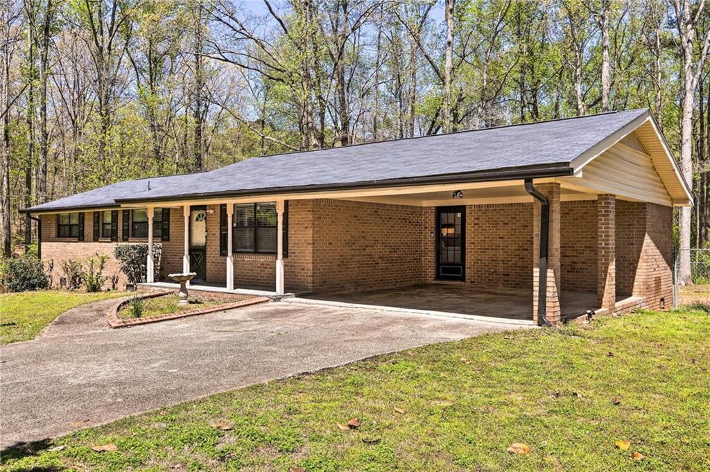 Short term rental opportunity! This attractively decorated/fully furnished suburban home offers great space for gatherings or work travel assignments. Spacious 5 Bedroom, 3 bathroom home, Great kitchen with open floor plan opening to family room with fireplace. Large master suite with sitting room & bathroom. Double garage with opener and private deck in backyard within a Quiet golf community close to Interstate 20. Local amusement parks close by and plenty of shopping opportunities, 20 minute commute to Downtown Atlanta.