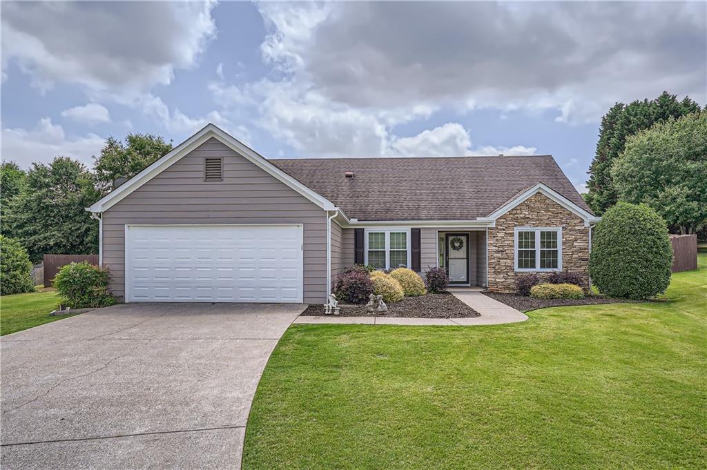 Come see this split floorplan ranch in a beautiful neighborhood with a great location! Amazing kitchen with granite counter tops and stainless steel appliances has a serving bar into the great room for easy access. This open and airy floorplan with cathedral ceiling in the great room allows for big gatherings with an oversized dining room. The back yard is a must see paradise with a level lot and gorgeous covered patio for evening meals and lounging. The large private fenced in backyard is great for both family and friends and has plenty of room for a garden or swing set. Pool access in the front of the neighborhood is a perfect summer getaway with low HOA fees. This lovely home is nested at the end of cul-d-sac and is a must see!