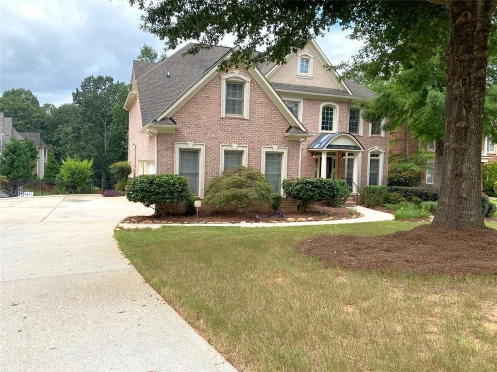 This Lithonia gem is in pristine condition. A Beautiful Masterpiece with Exquisite Craftsmanship! The open-concept design enhances the airy, light-filled atmosphere, while hardwood floors add warmth and elegance. It boasts a 2-story foyer that meets the separate living, dining rooms, & breakfast area, opening up to a stunning great room with soaring ceilings & windows. With a possible guest room on the main floor. A stellar kitchen with stunning island & plethora of full-size cabinets, Stainless Steel appliances, gas cook, electric water heater. Spacious master suite with large spa bath, double master closets, his & hers. 3 Large additional bedrooms & 2 bathrooms upstairs. 1 additional bedroom and 1 bathroom on the main floor. If additional space is needed, come with a vision to transform 85% of an unfinished basement into your entertainment world. When completed full basement will have 1 additional bedroom, a home Gym, a theater room, a pool area, and an Office. The seller will leave the material already in place. House comes with an American Home Shield one-year warranty, Ring Security System, some furniture, an entertainment system, and water purification, installed.