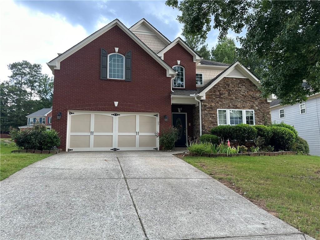 Beautiful traditional 4 Bedroom / 3 Bath Executive Home in Collins Hill High School District. The house has bright open floor plan, two story foyer, Spacious open kitchen with breakfast area and Bar, granite countertops, Hardwood flooring on the main. On the upstairs, master suite with sitting room, master bath with double vanities, oversized shower and huge walk in closet. A Very spacious sized secondary bedroom walk in closet. Fence private backyard with some fruit trees. Grate location, Closed to Mall of Georgia, GA Gwinnett College, Rock Spring Park & Soccer Complex, and the newly constructed Northside Hospital. A true gem within the vibrant and rapidly growing Gwinnett region! Super easy access to I-85, I-985, and Highway 316.