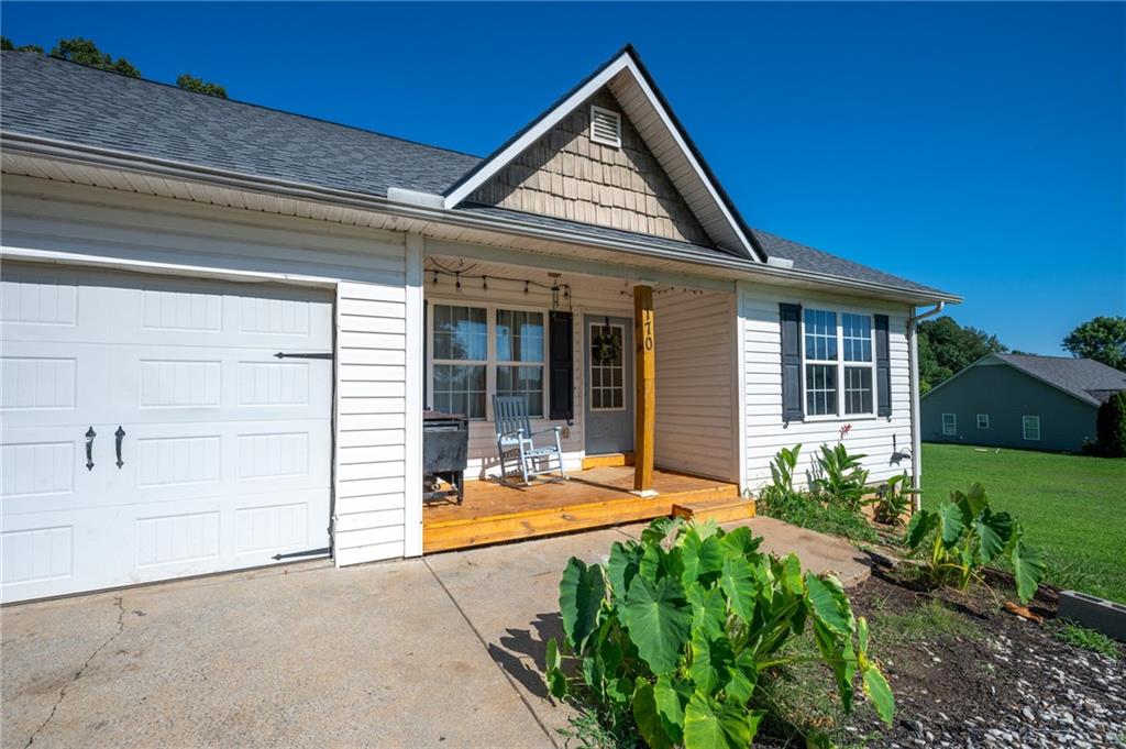 Welcome to this charming 3-bedroom, 2-bath ranch tucked away on a large 0.69-acre lot in Calhoun! From the moment you pull up, you’ll notice the inviting rocking chair front porch. Out back, there’s a generous yard with room to garden, play, or host summer get-togethers. The back deck is perfect for grilling and relaxing, and the one-car garage adds both storage and convenience. The exterior is low maintenance and the location is convenient. The interior layout is open and comfortable with a cozy living space and a bright kitchen featuring a center island, plenty of cabinet space, and a sunny breakfast area that overlooks the backyard. Whether you’re a first-time buyer or looking to downsize, this well-kept home offers the ideal mix of charm, function, and location all at an affordable price.
Don’t miss your chance to make it yours- schedule a showing today!