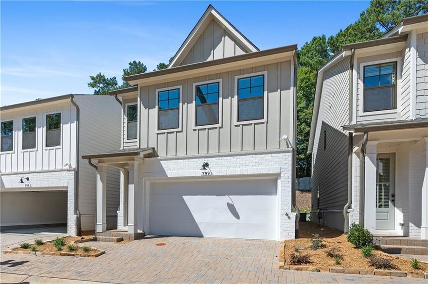 Come Make this 1 year Old New Construction Single Family Your Home Today! This 3/2/1 Home has more Sq Footage than others located In The Wonderful Gated Community of The Village at Towne Lake. This Complete, Bright and open Floor Plan Features LVP Flooring throughout Main Level. Large Kitchen featuring Quartz Countertops, Kitchen Island w/ bar & Tons of Cabinet Space. Modern, electric fireplace in palatial Family/Living room. All bedrooms upstairs Feature New Carpet, including the Primary suite w/ Double Vanity & spa like shower. 2 Good Size Secondary Bedrooms w/ Shared Bath. Laundry room conveniently located upstairs. Neighborhood amenities Include gorgeous clubhouse, pool, and pickle ball courts. Perfect location to Downtown Woodstock, dining, shopping, medical facilities, and I-575 and More.