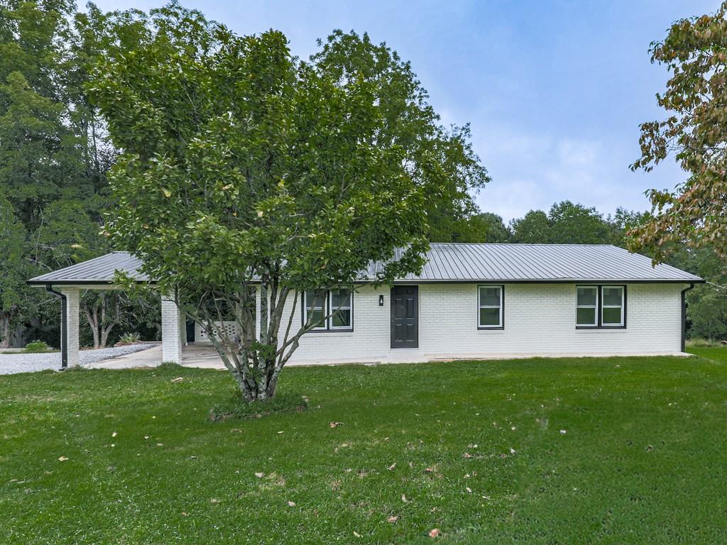 Rare Opportunity – minutes to Downtown Jasper! $10,000 CLOSING COST CREDIT OFFERED WITH ACCEPTABLE OFFER!
This fully renovated four-sided brick ranch offers the perfect blend of timeless charm and modern living. Featuring 3 bedrooms, 2 bathrooms, and 1,496 sq. ft. of thoughtfully designed space, this home sits on a spacious .75-acre lot just minutes from the heart of Jasper.
The exterior has been refreshed with crisp white paint and a sleek metal roof, creating stunning curb appeal. Step inside to discover a completely gutted and reimagined interior with an open-concept floor plan, brand-new kitchen with quartz countertops and custom cabinetry, and new flooring throughout. Both bathrooms have been beautifully gutted and updated, offering a fresh and modern feel in every corner of the home.
Enjoy the convenience of being within MINUTES to downtown Jasper’s Roper Park, shops, restaurants, hospital, and more, with quick access to Highway 515 for an easy commute.
This one won’t last long—schedule your showing today!