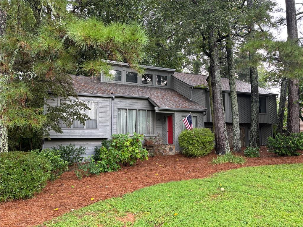 Coming Soon - Charming East Cobb Retreat: Spacious 5-Bedroom Home in Sought-After Location! Welcome to your dream home at 20 Ashton Woods Dr., Marietta, GA 30068—a stunning, well-loved residence that radiates warmth, style, and endless possibilities! This inviting 5-bedroom, 3-bathroom gem offers an impressive 3k+ square feet of thoughtfully designed living space on an oversized lot, perfectly blending modern comfort with timeless appeal. Built in 1983 and lovingly cared for ever since, this property is a rare find in the heart of East Cobb, where every detail screams quality and convenience. Step inside to discover an open and airy floor plan flooded with natural light, featuring a cozy fireplace in the giant family room, and a gourmet kitchen with a breakfast nook overlooking the upper deck. The primary suite is a true oasis, complete with high ceilings and a private balcony for early morning coffee in nature. The adjoining bathroom features two brand new skylights, a large corner soaking tub, and walk-in closet with built in closet organization. Two additional spacious bedrooms upstairs provide plenty of room for family or guests, each with easy access to a full bath. Downstairs you will find the 4th and 5th bedrooms with an oversized full bathroom to share. The 5th bedroom can easily be converted to an office, children's playroom, cozy den, theater room, workout room, etc. Deck it out for the big game and let the party spill out on to the oversized deck through the sliding glass doors. This downstairs level was expertly crafted by the original builder as an integral part of the home—not some hasty afterthought addition! This versatile lower level adds incredible value. It’s the ultimate space for entertaining, relaxing, or pursuing hobbies, all while maintaining the high standards of the home’s original construction. Outside, the freshly painted home catches your eye with its stunning front door and multiple textures. The brand new, designer shingles and oversized, new gutters complete the look of this handsome home. You will find mature landscaping, a serene backyard, and a spacious, multi-level wood deck that is ideal for barbecues and outdoor gatherings. The two-car garage and ample driveway parking add to the everyday ease of living here. The garage is very deep and can accommodate more than two vehicles and even a boat! Nestled in the vibrant East Cobb community of Cobb County, this home puts you at the center of it all! Ten minute drive to the historic Marietta Square or the East Cobb Avenues, you are close to all manner of boutiques, antique shops, and trendy retail spots for all your shopping needs. Easy access to I-75 with multiple routes available to take the stress out of rush hour. Families will love the top-rated Cobb County public schools, including the innovative Magnet Program in Science, Mathematics, and Technology at nearby Wheeler High School. This prestigious program empowers students with advanced, hands-on curriculum, research opportunities, internships, and a supportive community of like-minded peers—preparing them for success in STEM fields and beyond. It’s no wonder Wheeler Magnet has been transforming young minds for over 20 years! Priced to reflect its premium location, condition, and unique builder-finished features, this home is poised to sell quickly in today’s hot market. Don’t miss your chance to own a slice of East Cobb paradise—schedule your private showing today and start envisioning your future here!
