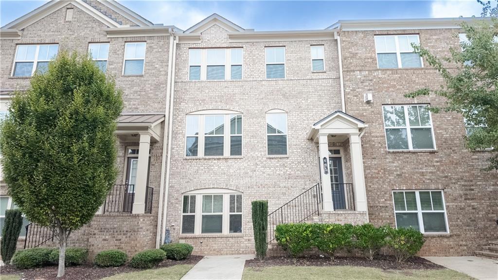 Welcome to this beautifully maintained 3-bedroom, 3.5-bathroom townhouse available for lease in the highly desirable Peachtree Ridge High School district in Suwanee, GA! This charming home offers plenty of space and a convenient layout, with one bedroom and a full bathroom located on the lower level, perfect for guests or a home office. The main level features an open-concept living area with ample natural light, a spacious kitchen, and a dining area, perfect for entertaining or relaxing. The upper level includes a master suite with an en-suite bathroom and a second bedroom with its own private bathroom. Located just minutes from top-rated schools, parks, shopping, and dining, this townhouse offers both comfort and convenience. Enjoy the best of Suwanee living with easy access to all the amenities you need!