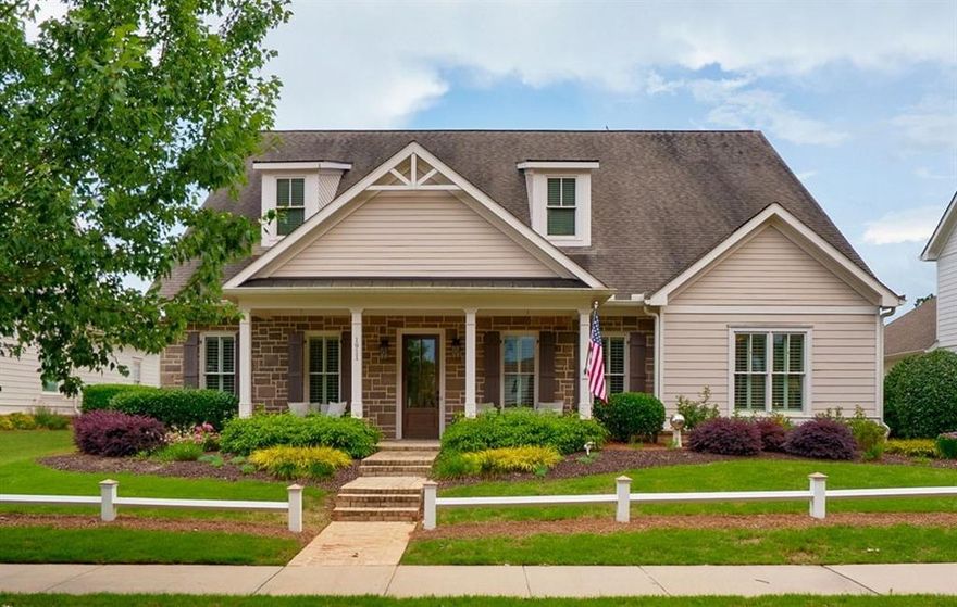 Welcome to 1911 Bent Pine Park nestled on a professionally landscaped lot in the desirable Bent Pine community of The Georgia Club. Featuring the highly sought after Rossmoor plan, this home offers 4 private bedrooms each with their own ensuite bath. As you enter from the covered front porch overlooking the park, you notice the soaring ceilings and wonderful layout with crown molding, hardwood floors, plantation shutters and lots of storage. The dining room can easily seat a large group and flows past a powder room or through a convenient butler's pantry to the chef's kitchen which opens to the vaulted ceiling great room. The kitchen with stainless steel appliances offers double ovens, a 5-burner gas stove, lots of cabinets & soft close drawers, a generous sized island and a large breakfast room. The vaulted ceiling great room with a stone gas fireplace and lots of natural light is a perfect entertaining space with access to a lovely oversized covered back porch and private patio area. The primary suite on main with spa like bath has dual sinks, a large soaking tub, a zero-entry shower and connects to the primary closet with custom closet shelving that conveniently flows into the laundry room with folding counter and laundry sink. Just off the laundry room is a perfect landing spot with built ins and access to the 2.5 car garage with epoxy coated floors and ample room for a golf cart. In addition, on the main level is a 2nd bedroom with its own ensuite full bath. Upstairs is a generous sized loft area perfect for a den, a home office or exercise area with a huge walk-in attic storage space perfect for all your storage needs. Two additional private bedrooms up each have their own ensuite bathrooms and great closet space. This lovely property with a functional floorplan that offers main level living with additional bedrooms & space upstairs for guests is a must see. Memberships to enjoy 27 holes of golf, 6 tennis & 4 pickleball courts, 2 pools with cabana service, a fitness center, a clubhouse with casual & fine dining, a community garden, dog park and neighborhood firepits are available to residents. In addition, this home has weekly professional lawn service at $627 per quarter allowing the homeowner more free time to enjoy The Georgia Club and the surrounding Athens area.