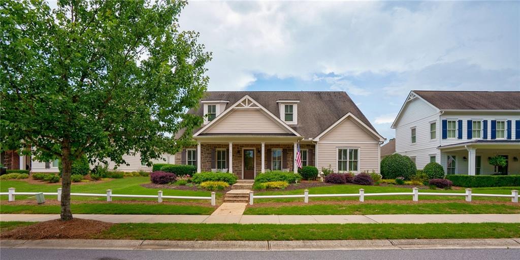 Welcome to 1911 Bent Pine Park nestled on a professionally landscaped lot in the desirable Bent Pine community of The Georgia Club. Featuring the highly sought after Rossmoor plan, this home offers 4 private bedrooms each with their own ensuite bath. As you enter from the covered front porch overlooking the park, you notice the soaring ceilings and wonderful layout with crown molding, hardwood floors, plantation shutters and lots of storage. The dining room can easily seat a large group and flows past a powder room or through a convenient butler's pantry to the chef's kitchen which opens to the vaulted ceiling great room. The kitchen with stainless steel appliances offers double ovens, a 5-burner gas stove, lots of cabinets & soft close drawers, a generous sized island and a large breakfast room. The vaulted ceiling great room with a stone gas fireplace and lots of natural light is a perfect entertaining space with access to a lovely oversized covered back porch and private patio area. The primary suite on main with spa like bath has dual sinks, a large soaking tub, a zero-entry shower and connects to the primary closet with custom closet shelving that conveniently flows into the laundry room with folding counter and laundry sink. Just off the laundry room is a perfect landing spot with built ins and access to the 2.5 car garage with epoxy coated floors and ample room for a golf cart. In addition, on the main level is a 2nd bedroom with its own ensuite full bath. Upstairs is a generous sized loft area perfect for a den, a home office or exercise area with a huge walk-in attic storage space perfect for all your storage needs. Two additional private bedrooms up each have their own ensuite bathrooms and great closet space. This lovely property with a functional floorplan that offers main level living with additional bedrooms & space upstairs for guests is a must see. Memberships to enjoy 27 holes of golf, 6 tennis & 4 pickleball courts, 2 pools with cabana service, a fitness center, a clubhouse with casual & fine dining, a community garden, dog park and neighborhood firepits are available to residents. In addition, this home has weekly professional lawn service at $627 per quarter allowing the homeowner more free time to enjoy The Georgia Club and the surrounding Athens area.
