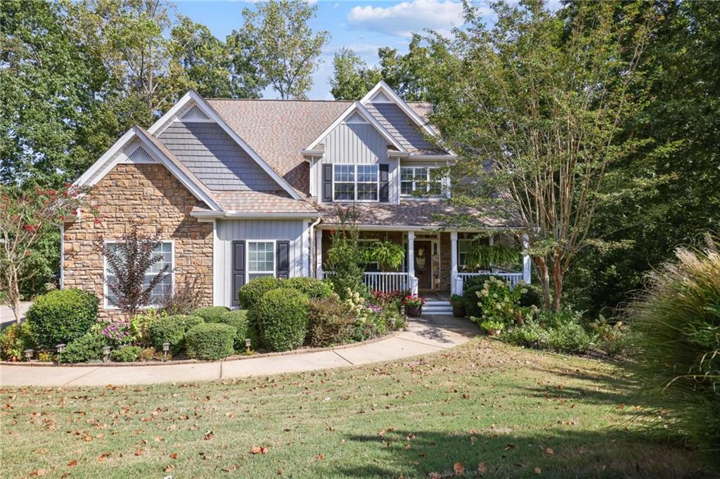 Welcome Home! Tucked away in a quiet cul-de-sac, this stunning 4-bedroom, 3.5-bath home offers the perfect blend of luxury and comfort. Step in and fall in love with the thoughtfully designed layout featuring a primary suite on the main level, complete with a spa-like bath, double vanity, walk in closet and separate soaking tub and shower. The spacious kitchen is both warm and functional, boasting rich granite countertops, a gas range, beautiful white cabinetry, kitchen island and plenty of prep and storage space—ideal for cooking and gathering. A conveniently located laundry room on the main level. Upstairs you’ll step into the loft which is a flexible space, think of the possibilities it could be a second floor tv room, a playroom…You'll also find a second primary suite with a private sitting area and bathroom. All bedrooms are a generous size. The terrace level is unfinished with high ceilings, very open and waiting for the new owner to customize for their family’s needs.  Outdoor space was made for entertaining or relaxing the charming, screened porch overlooks a private backyard, with an open deck perfect for your grill. Terrace level has a covered patio and the firepit will be a favorite gathering place for family and friends  Located in a sought-after area of Dallas, GA, this home is the total package—style, function, all in one. Conveniently located near shopping, schools, and restaurants. No
HOA. Don’t miss your chance to make this beautiful home your forever home! Schedule a showing today!