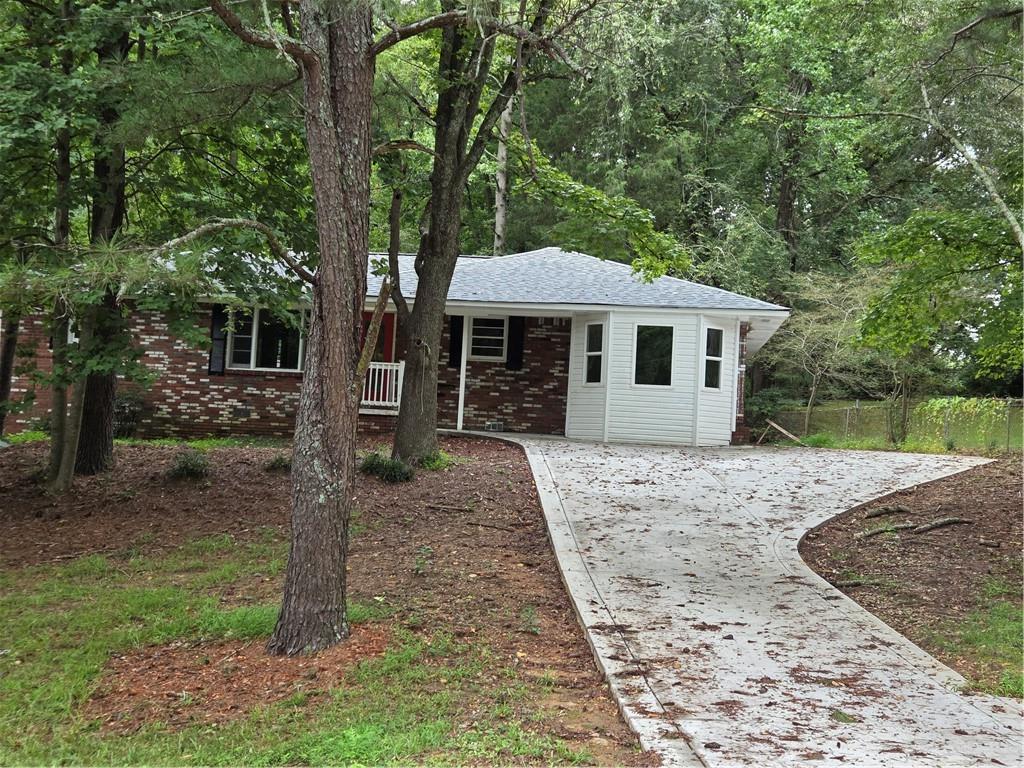 Ideal location in a 4 bedroom 2 and one half bath home with lots of natural light in Cobb county's largest city. Walk to grocery, dining, Silver Comet Trail, Barnes-Mable House Amphitheater and Arts Center for live concerts and events! This home is newly remodeled, with new bathroom, new roof, new driveway, updated HVAC, newly refinished original hardwood floors and fresh paint. Mableton location is a short drive to The Battery or Mercedes Benz Stadium, Vinings, Smyrna, Buckhead, the airport, the 285 Perimeter, I-20, and I-75.