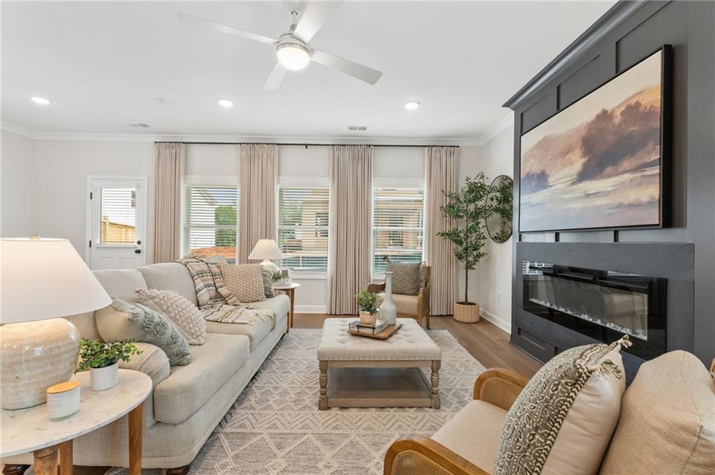 Welcome to Lot 45 The Fairview L plan READY February/March 2026 . Where comfort meets style in a relaxed, inviting atmosphere! This home boasts 4 bedrooms, and 2.5 baths, with a gorgeous exterior that catches the eye from the moment you arrive. Inside you will find a beautiful kitchen featuring a large island perfect for entertaining The living area is warmed by an electric fireplace, creating a cozy ambiance for gatherings or quiet nights in. Hardwood stairs leads you to a cozy spacious Owner's bedroom large walk-in closet, and luxurious shower with a bench seat offering a spa like escape after a busy day. 3 additional bedrooms, 1 full bath, and the laundry room complete the upper lever. Discover the perfect blend of charm and functionality in lot 28, The Fairview U Plan where every detail is designed for modern living at its finest!.. Great location and excellent school district. Close to shopping entertainment, 1 mile to Dupree park and 3miles to Downtown Woodstock! Call today to schedule an appointment to view our lots and plans. Come make this house your home and build equity as one of our first homeowners! Images of home are examples of floor plan colors and selections may vary. Hurry while there is still time to customize your interior finishes at our Amazing Design studio!
