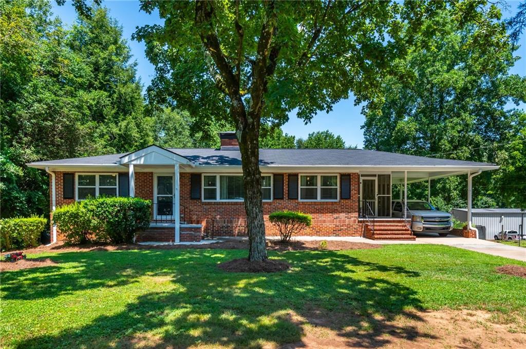 Fantastic opportunity on Main St in historic downtown Acworth. Built in 1957, the home has been beautifully renovated. Its history spans 8 decades, nearly 80 years of one family's stories. They say it's time for the next chapter to be written. Situated on .7 acres, this property is zoned R4. You can keep the home as a single family residence or build a multi-family complex. If you'd like to move your business here, the property is strategically located at the corner of Main St. and New McEver Road. The property should be easily rezoned as commercial as surrounding properties are zoned commercial. Perfect for an insurance agency, physician/dental office, shop, breakfast restaurant, coffee shop, hair salon, host classes for art and or special projects, possibilities are endless. Call our team for an early look, the property won't last long on the open market. The owners do live here, please call for an appointment to show.